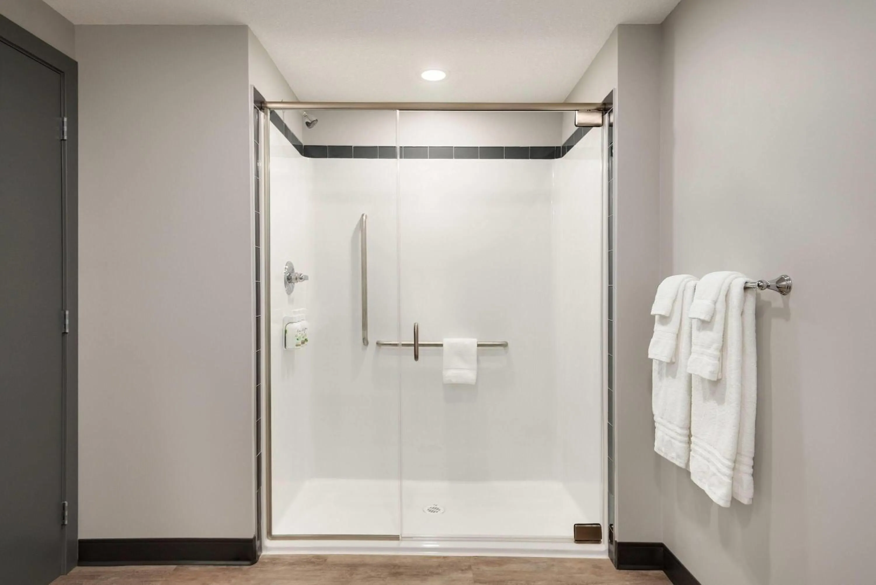 Shower in Ramada by Wyndham West Edmonton Hotel & Suites