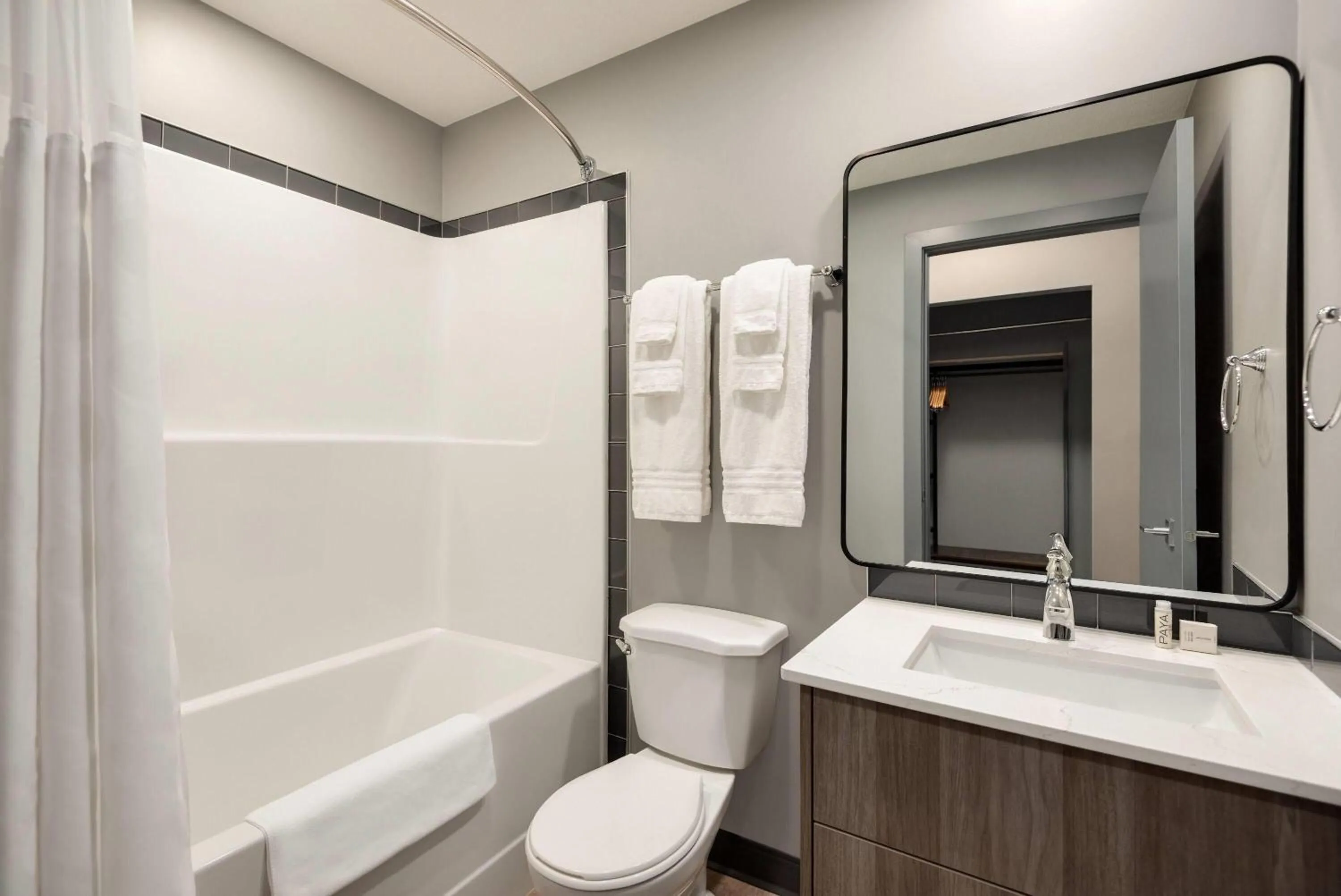 Bathroom in Ramada by Wyndham West Edmonton Hotel & Suites