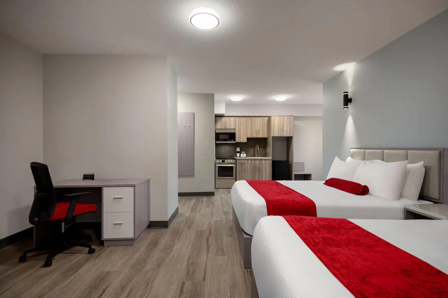Bed in Ramada by Wyndham West Edmonton Hotel & Suites