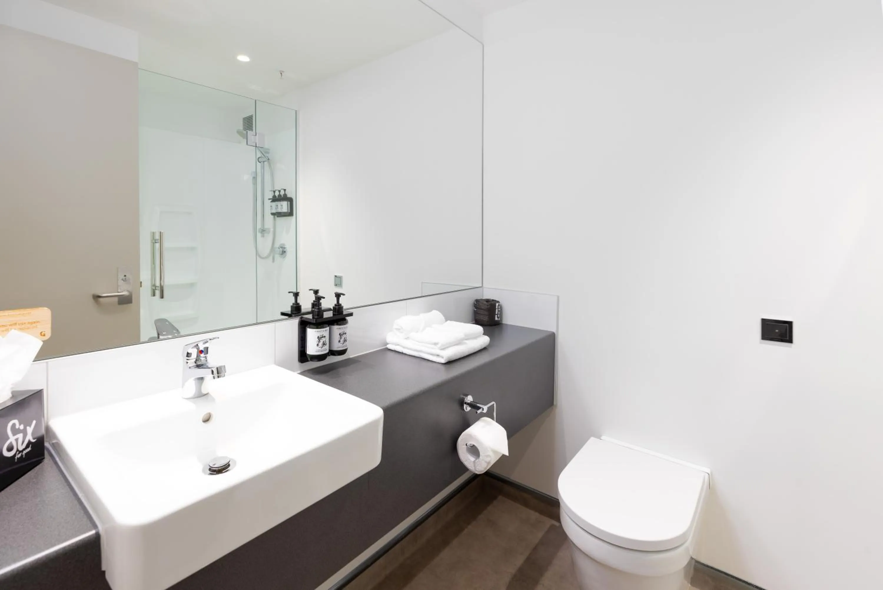 Bathroom in Hotel Give