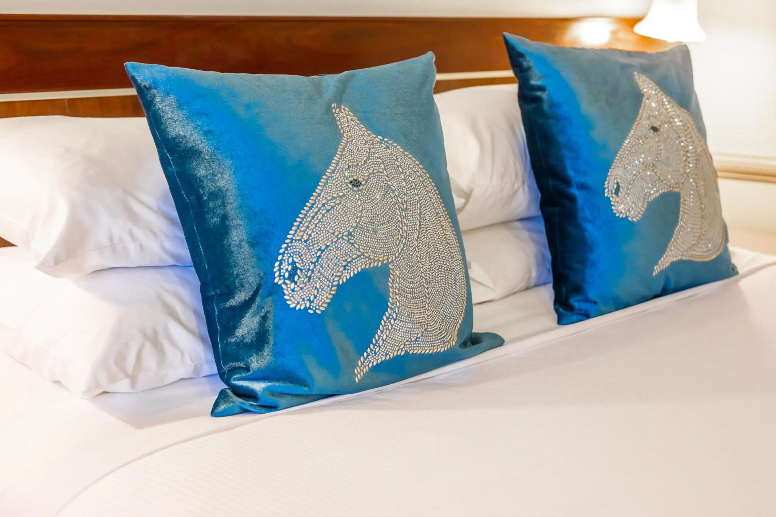 Bed in Twin Towers Inn