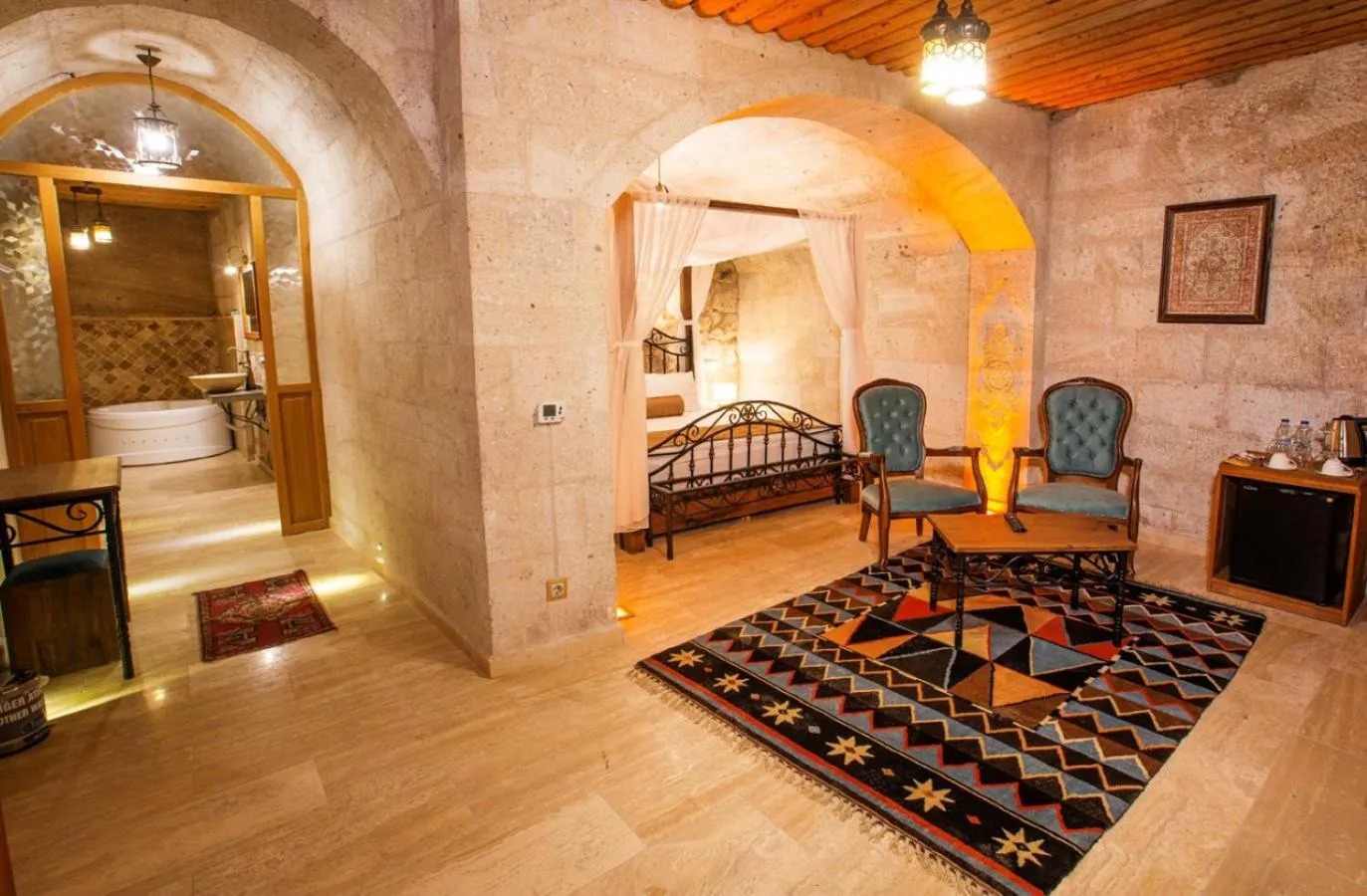 Bed in Caldera Cave Hotel