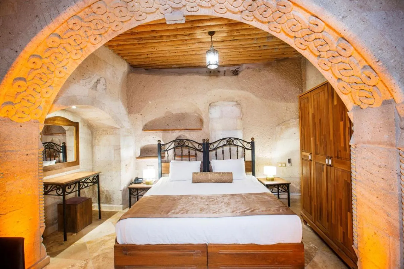 Bed in Caldera Cave Hotel