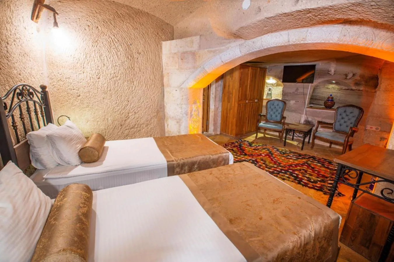 Bed in Caldera Cave Hotel