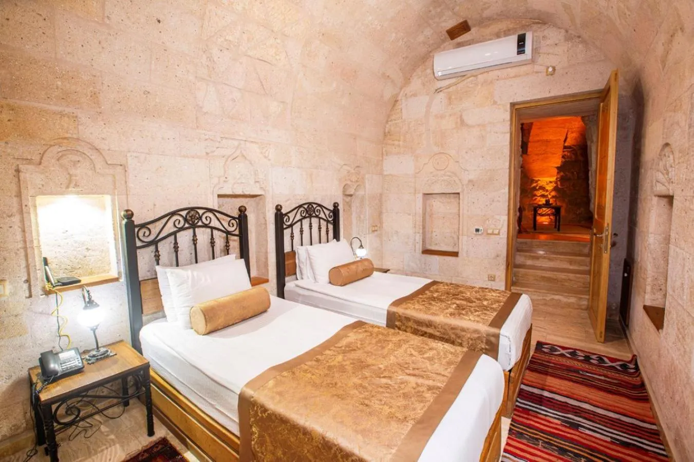 Bed in Caldera Cave Hotel