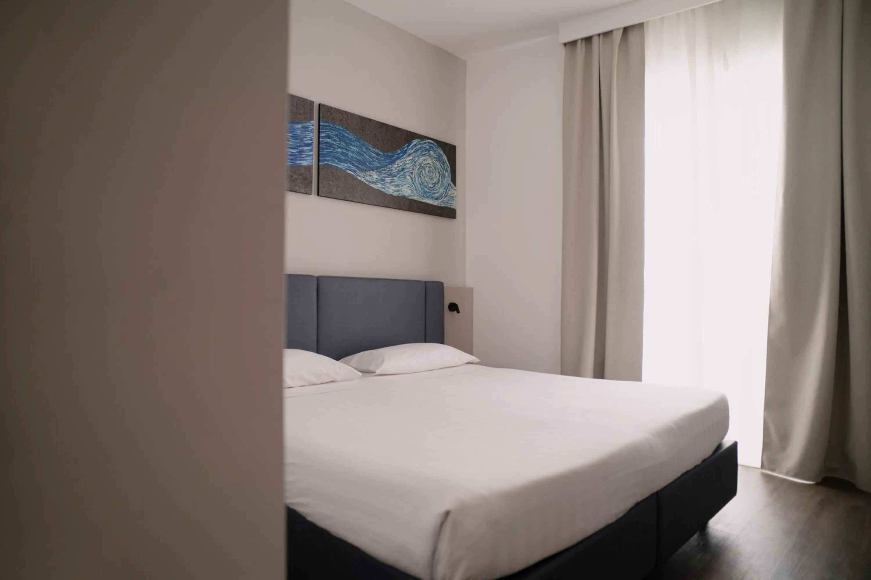 Bed in Sea Lion Hotel