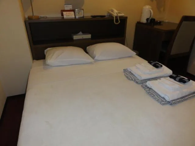 Bed in Hotel Yanagibashi