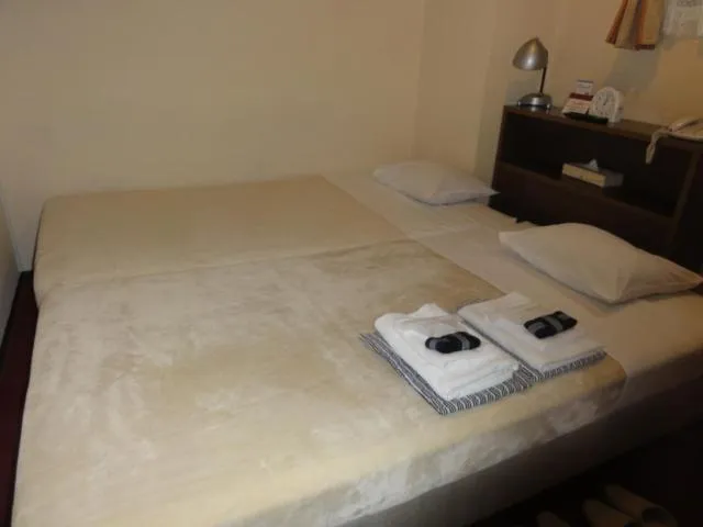 Bed in Hotel Yanagibashi
