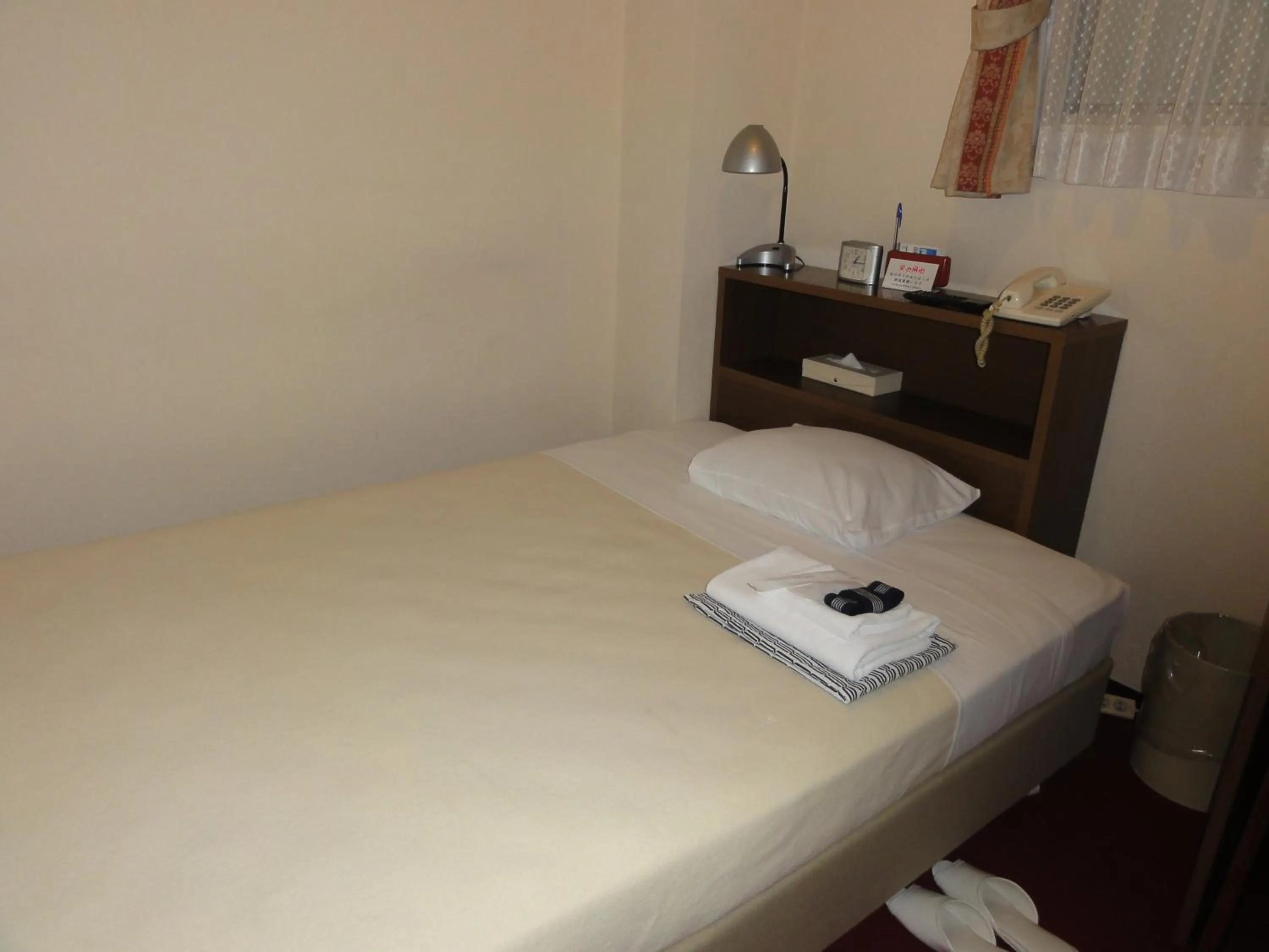 Bed in Hotel Yanagibashi