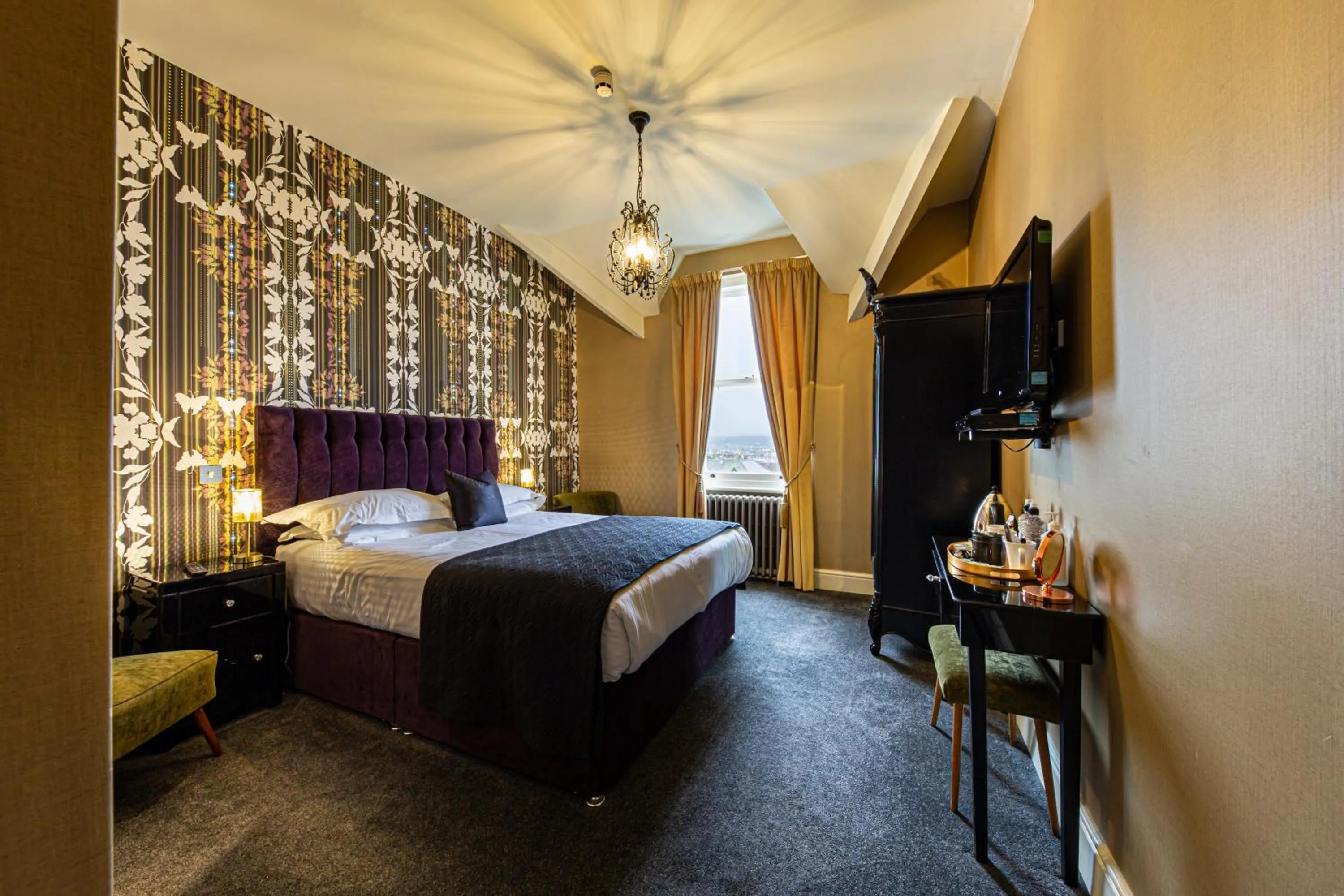 Bed in Escape Boutique B&B