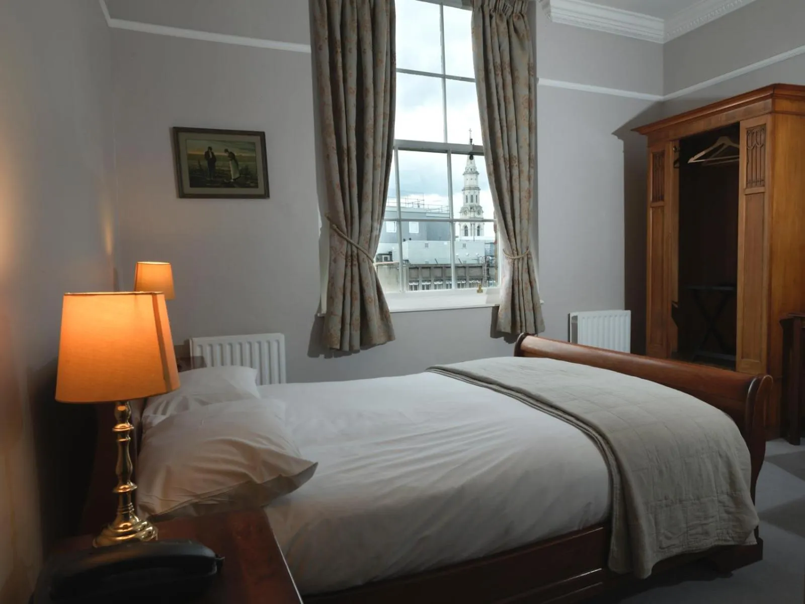 Bed in Harveys Guest House