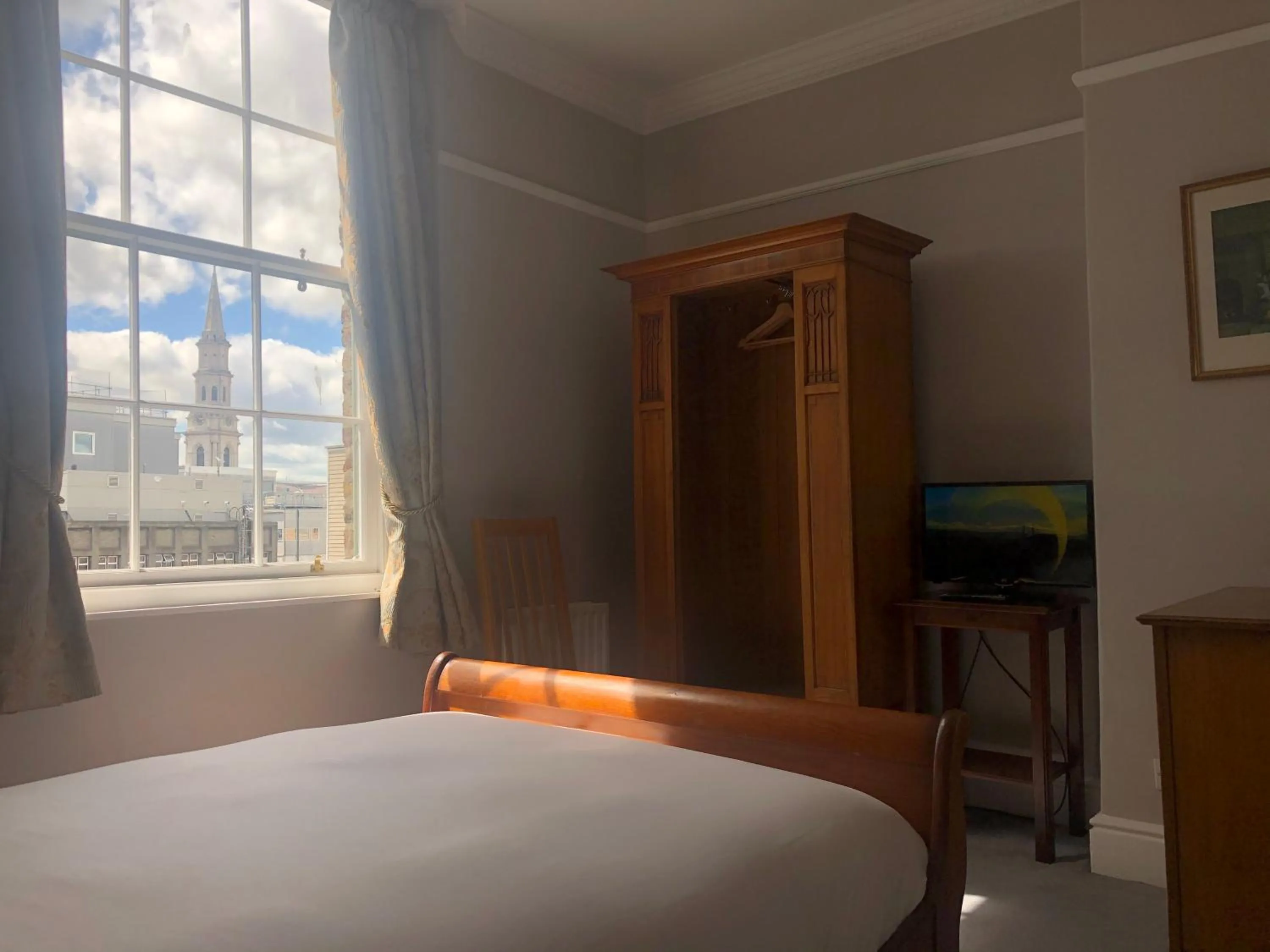 Bed in Harveys Guest House