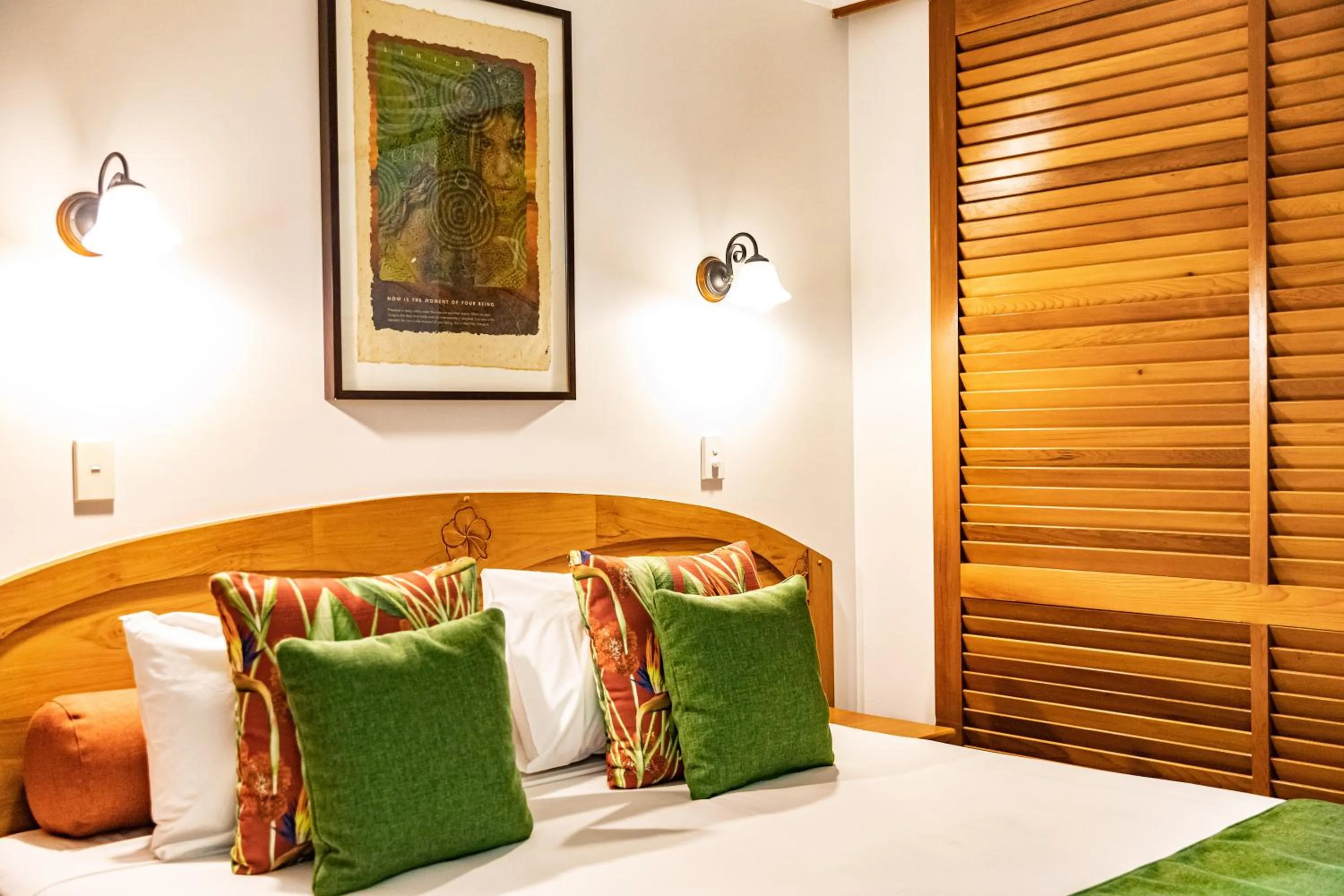 Bed in Hibiscus Resort & Spa - Official Onsite Reception & Check In