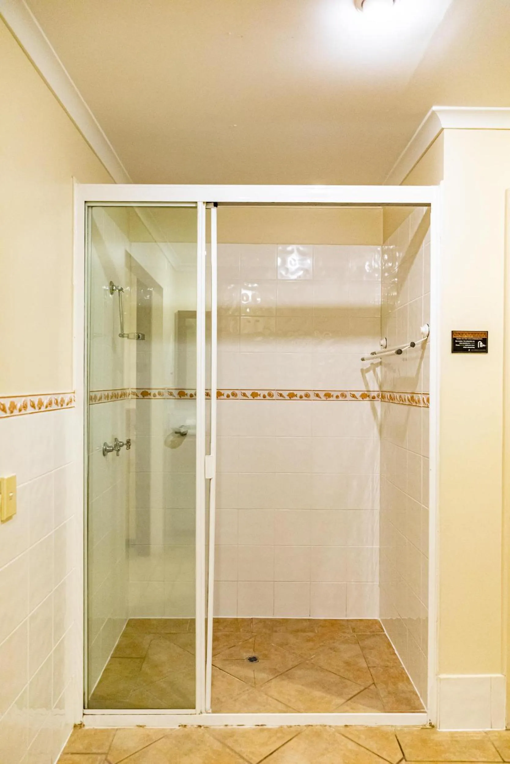 Shower in Hibiscus Resort & Spa - Official Onsite Reception & Check In