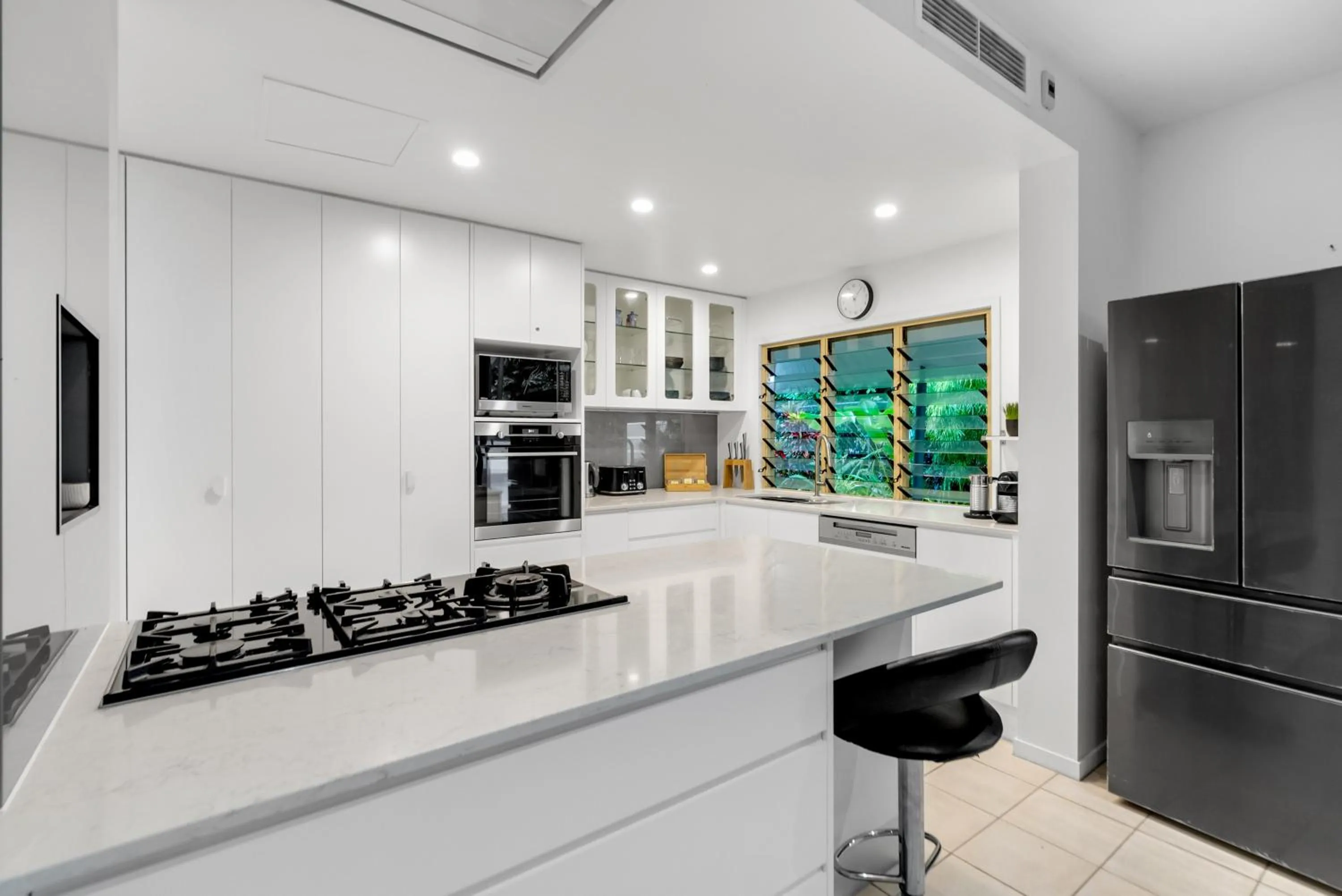 Kitchen or kitchenette in Sanctuary Palm Cove