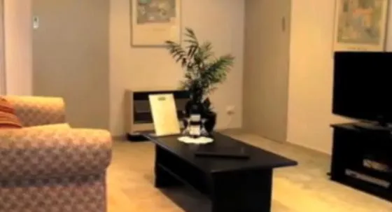 Living room in Clayton Monash Motor Inn & Serviced Apartments