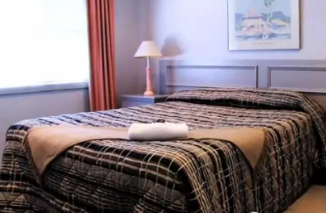 Bed in Clayton Monash Motor Inn & Serviced Apartments