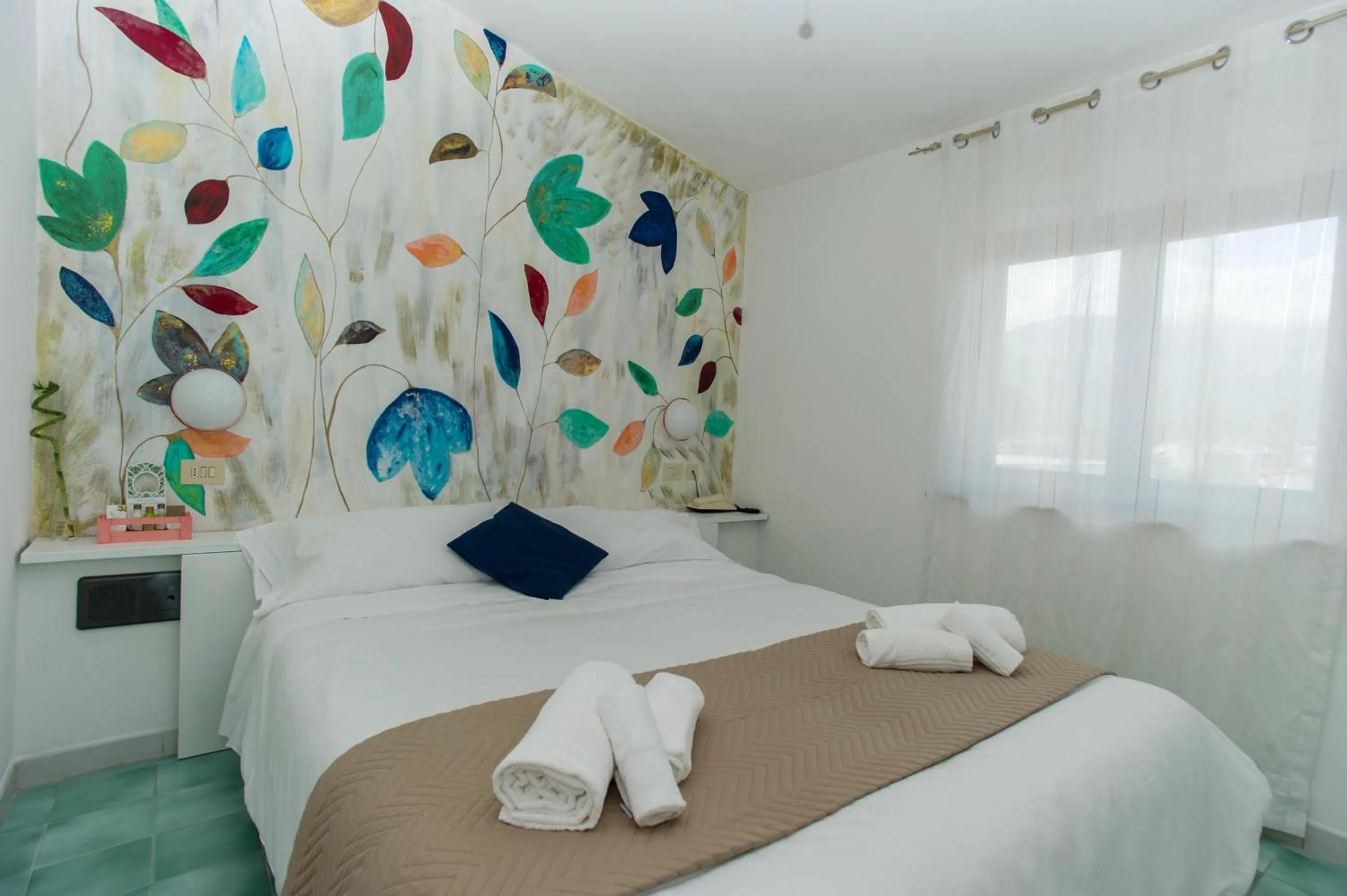 Bed in Hotel Punto Verde