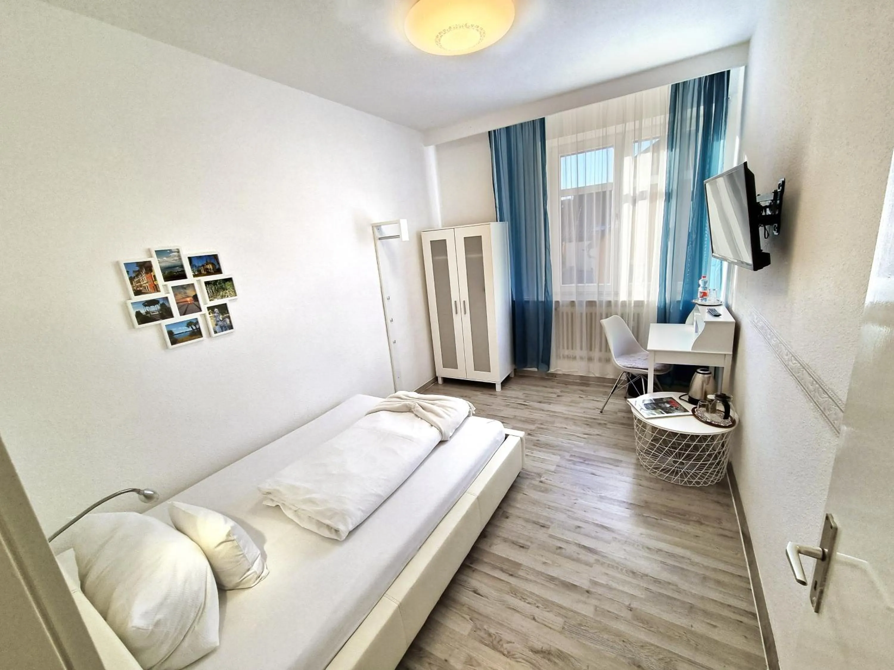 Photo of the whole room, Bed in Gesundheitshotel Rössle