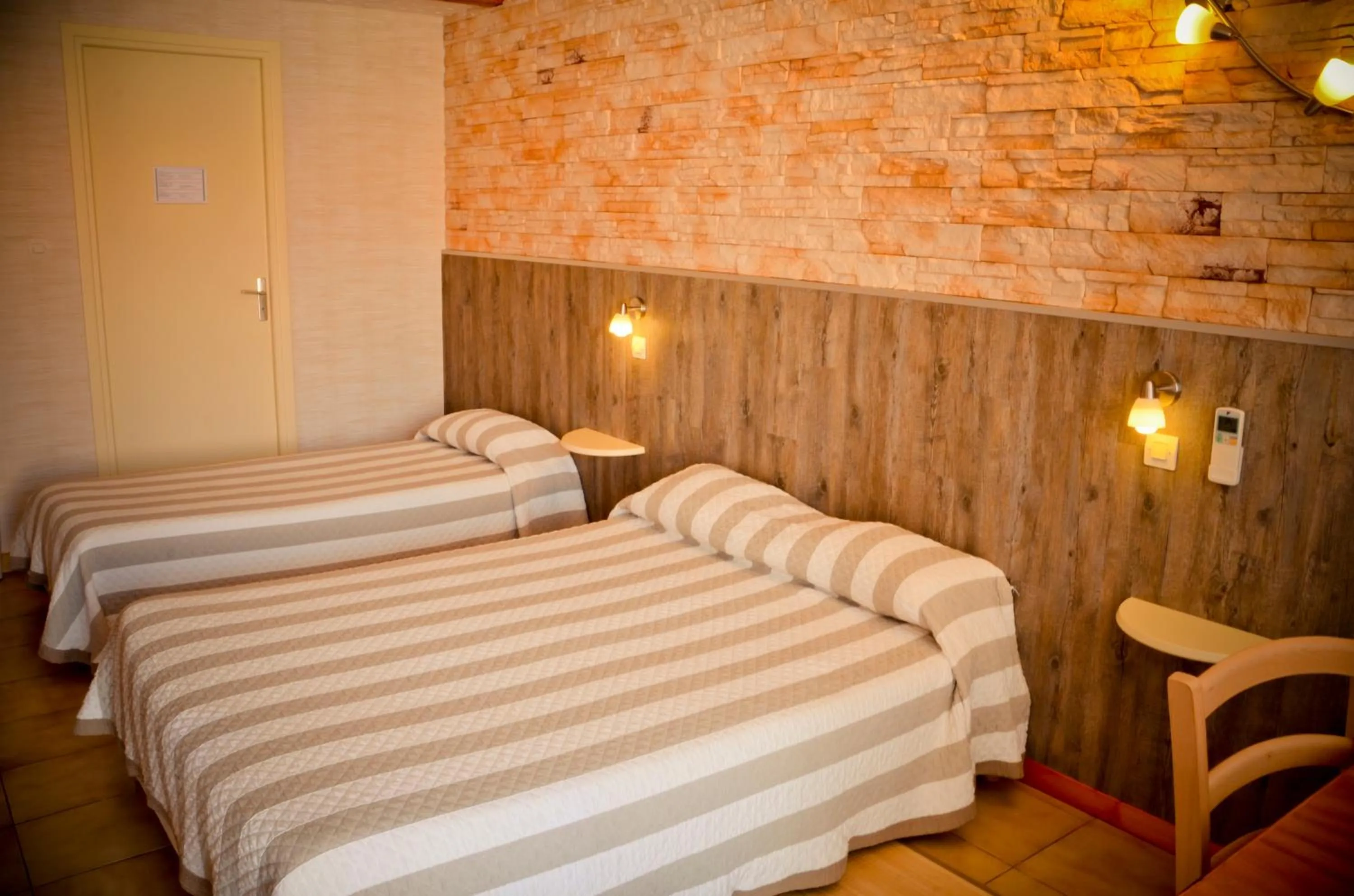 Bed in Hotel Les Pins