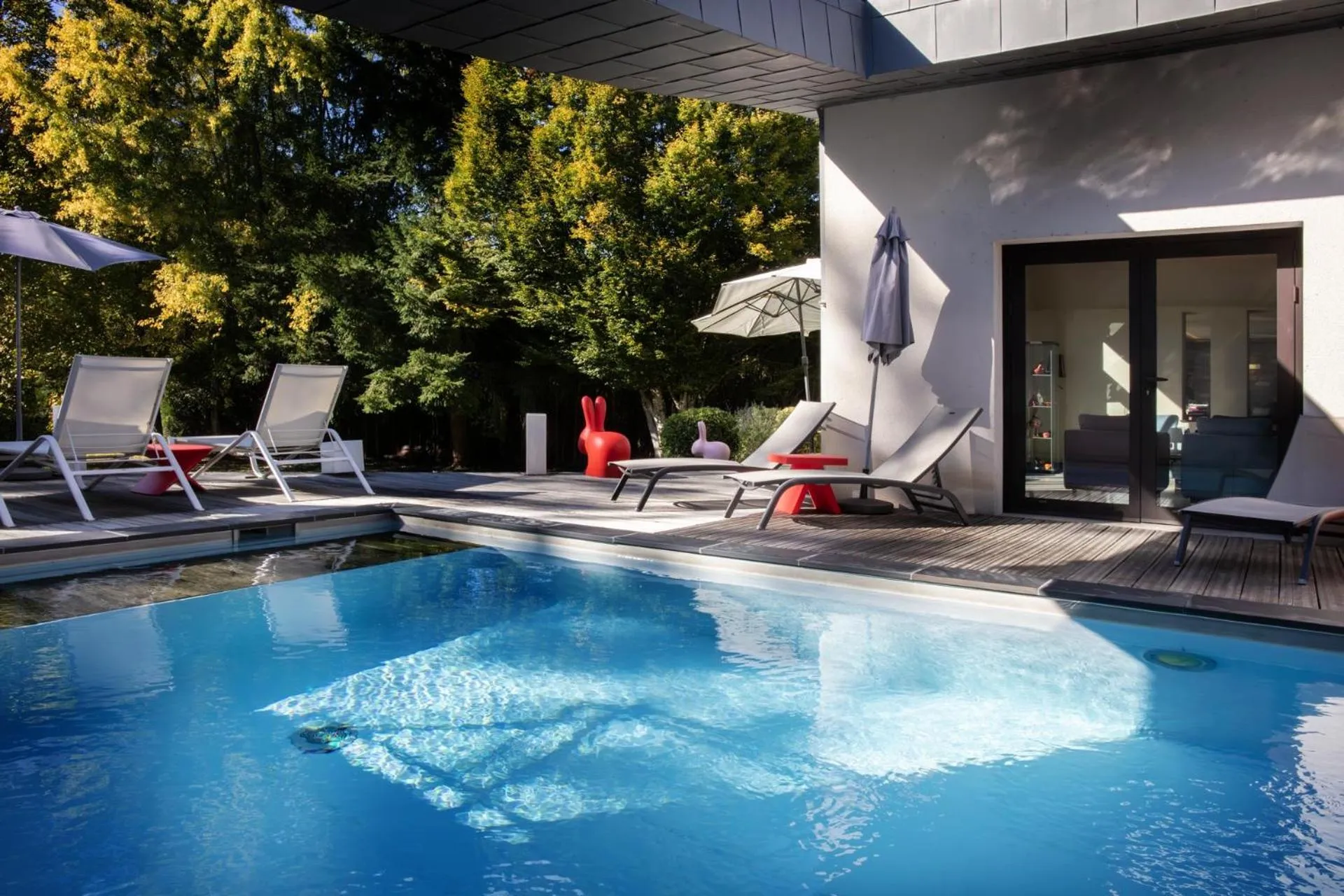 Swimming pool in L'Aubinière Hôtel Restaurant & Spa