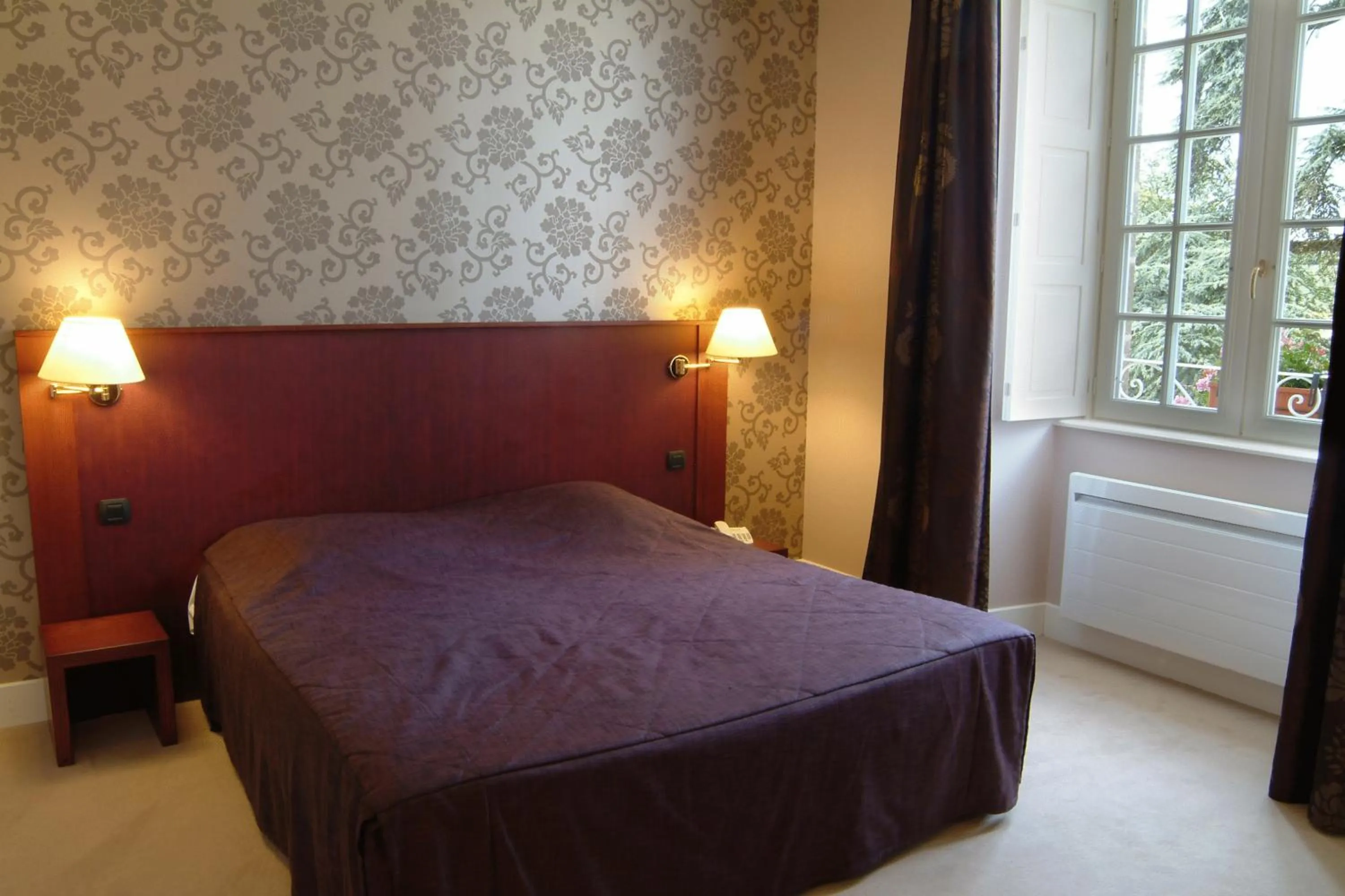 Photo of the whole room, Bed in Logis La Marjolaine