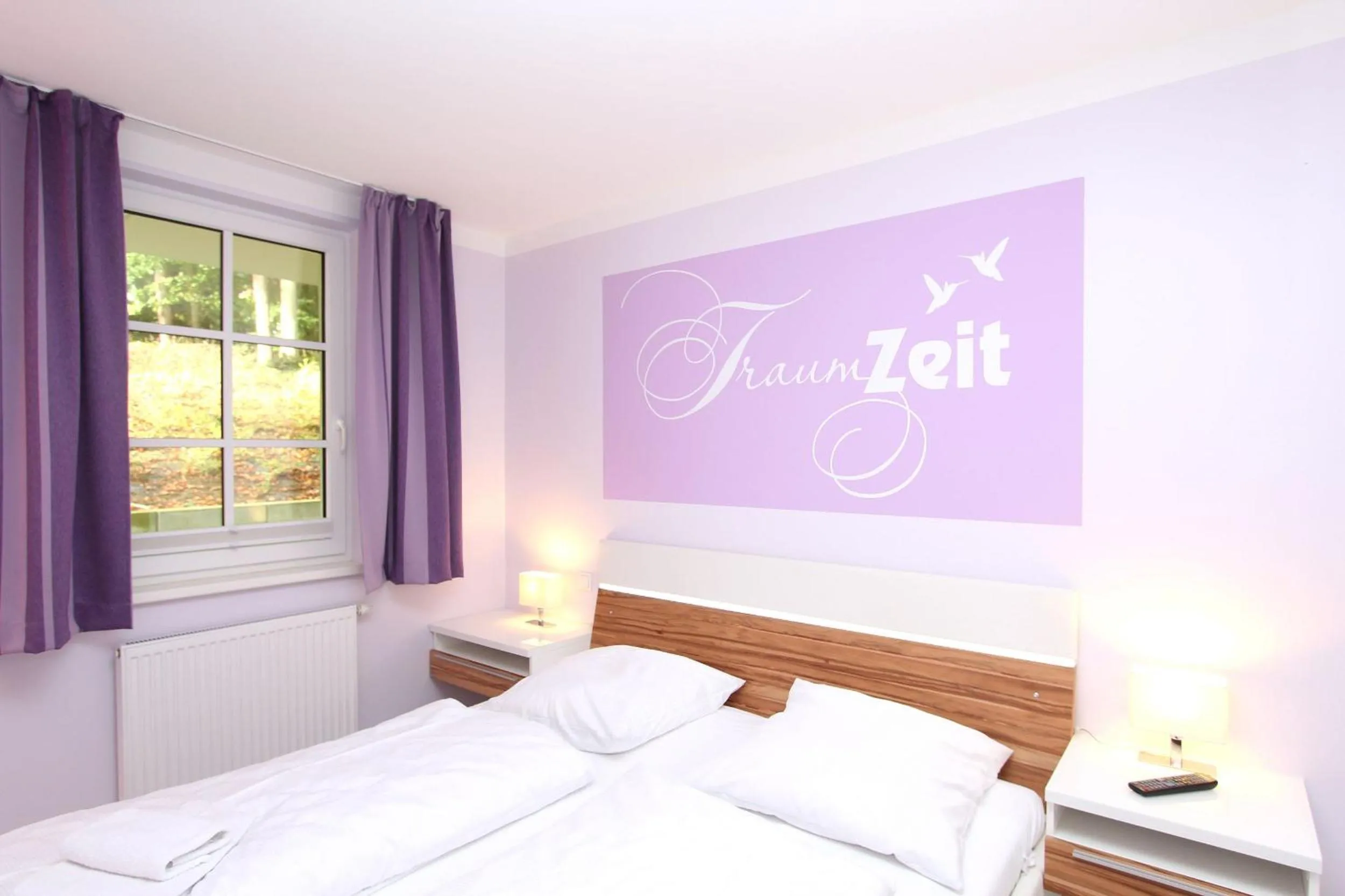 Bedroom, Bed in Strandresidenz Baabe Ferienwohnung 1-29 mit Sauna- und Schwimmbadnutzung im Haus