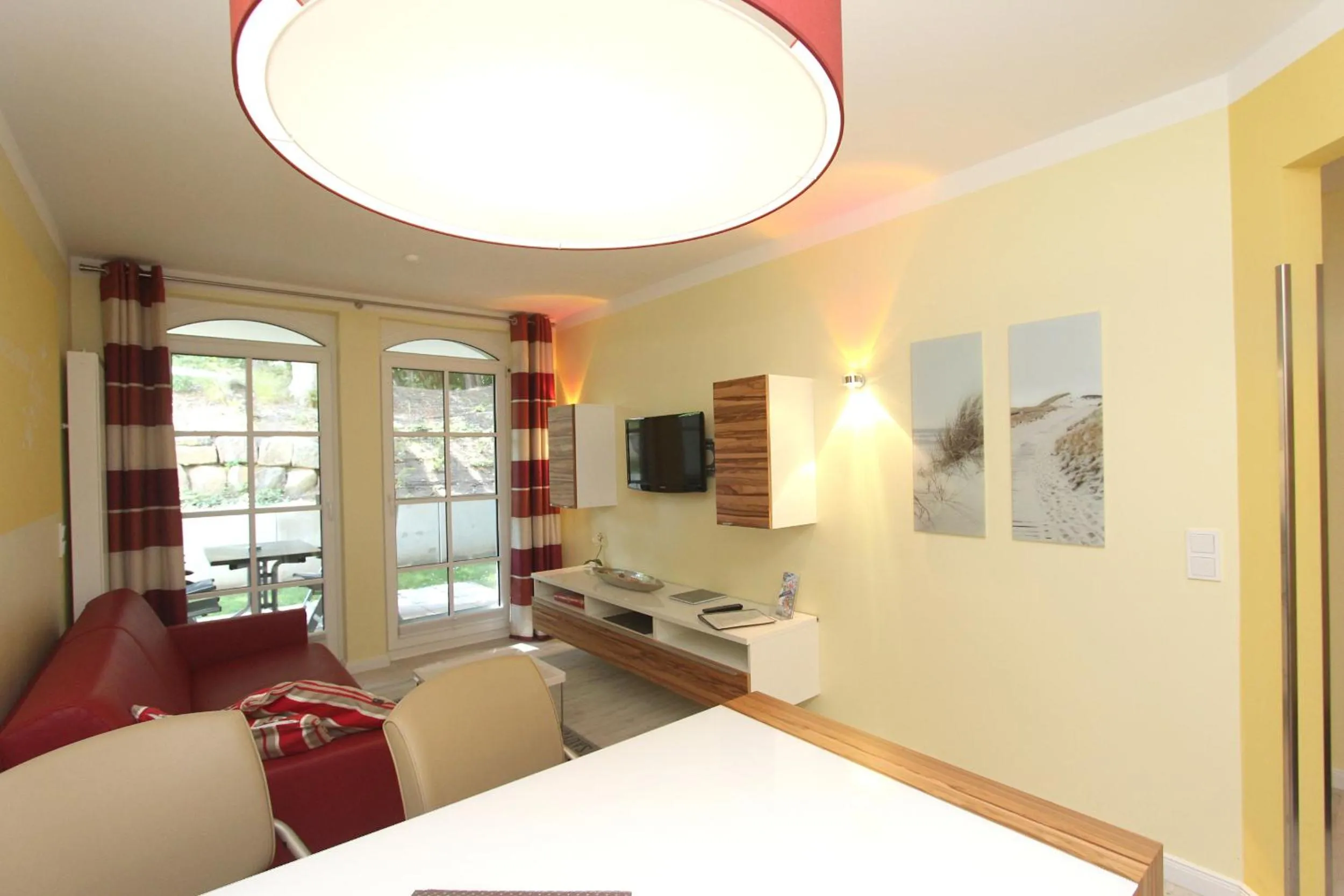 Living room, Bed in Strandresidenz Baabe Ferienwohnung 1-29 mit Sauna- und Schwimmbadnutzung im Haus