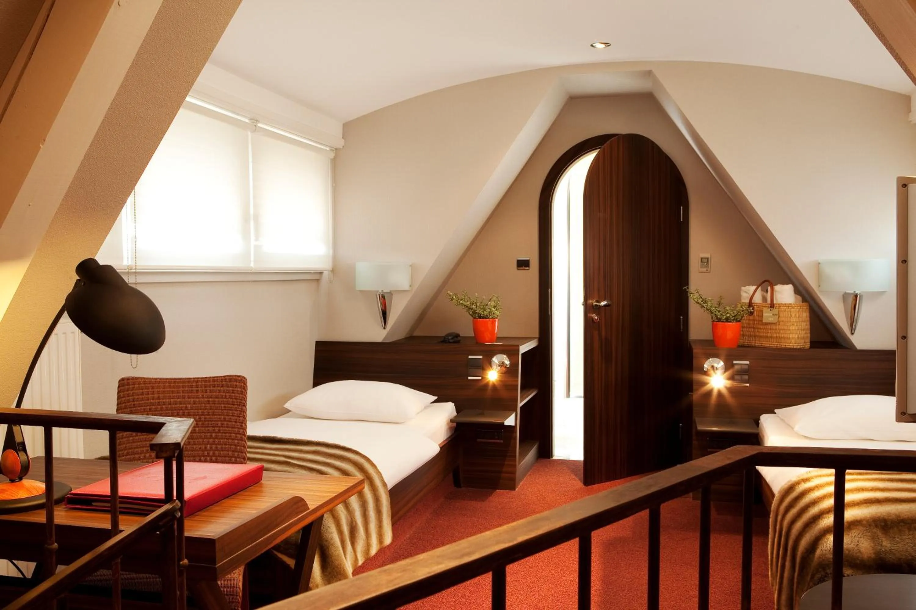 Bed in Le Parc Hôtel devient YONA