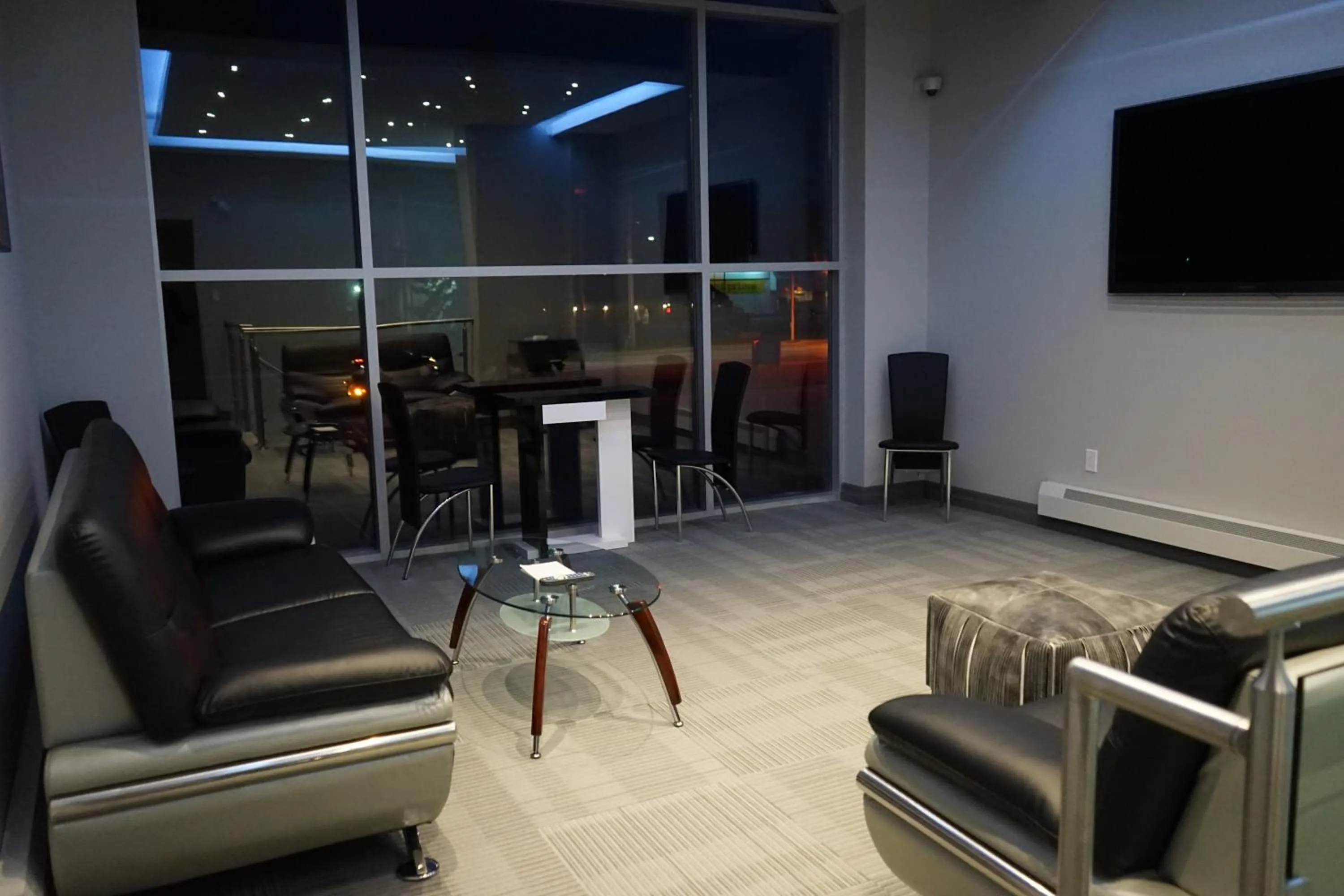 Communal lounge/ TV room in Amber Hotel