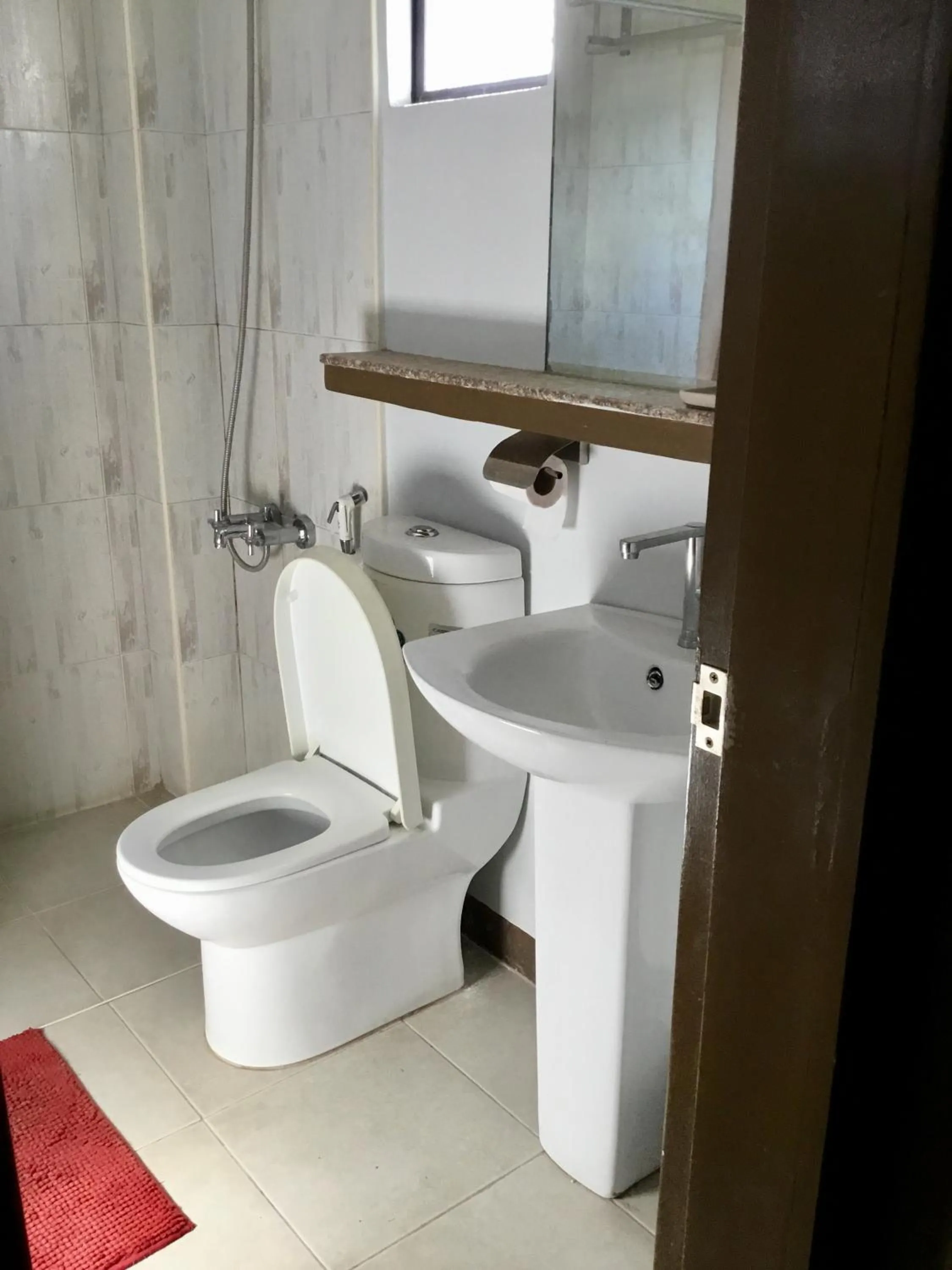 Toilet in Delle Suites