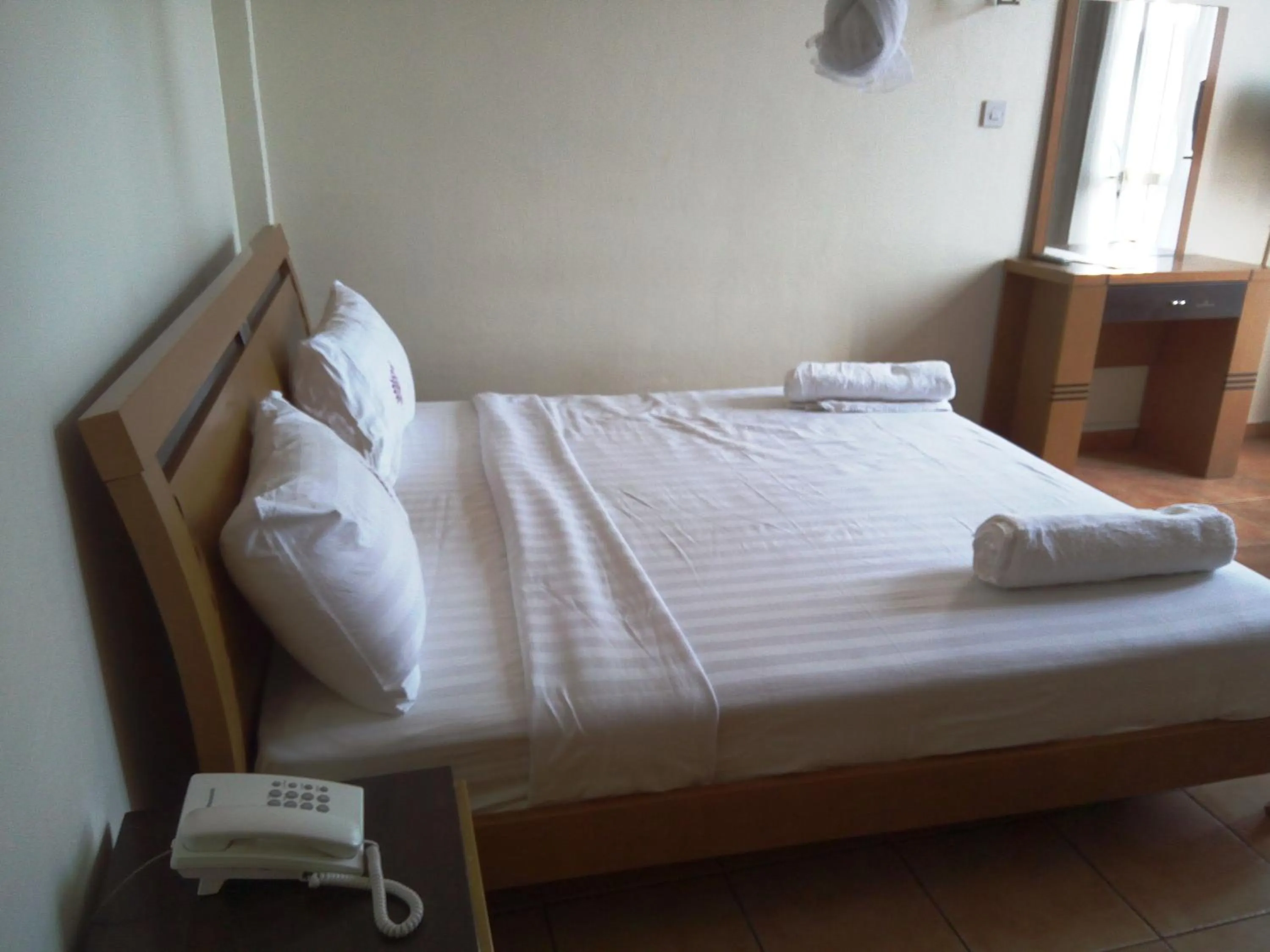 Bed in Aponye Hotel Kampala