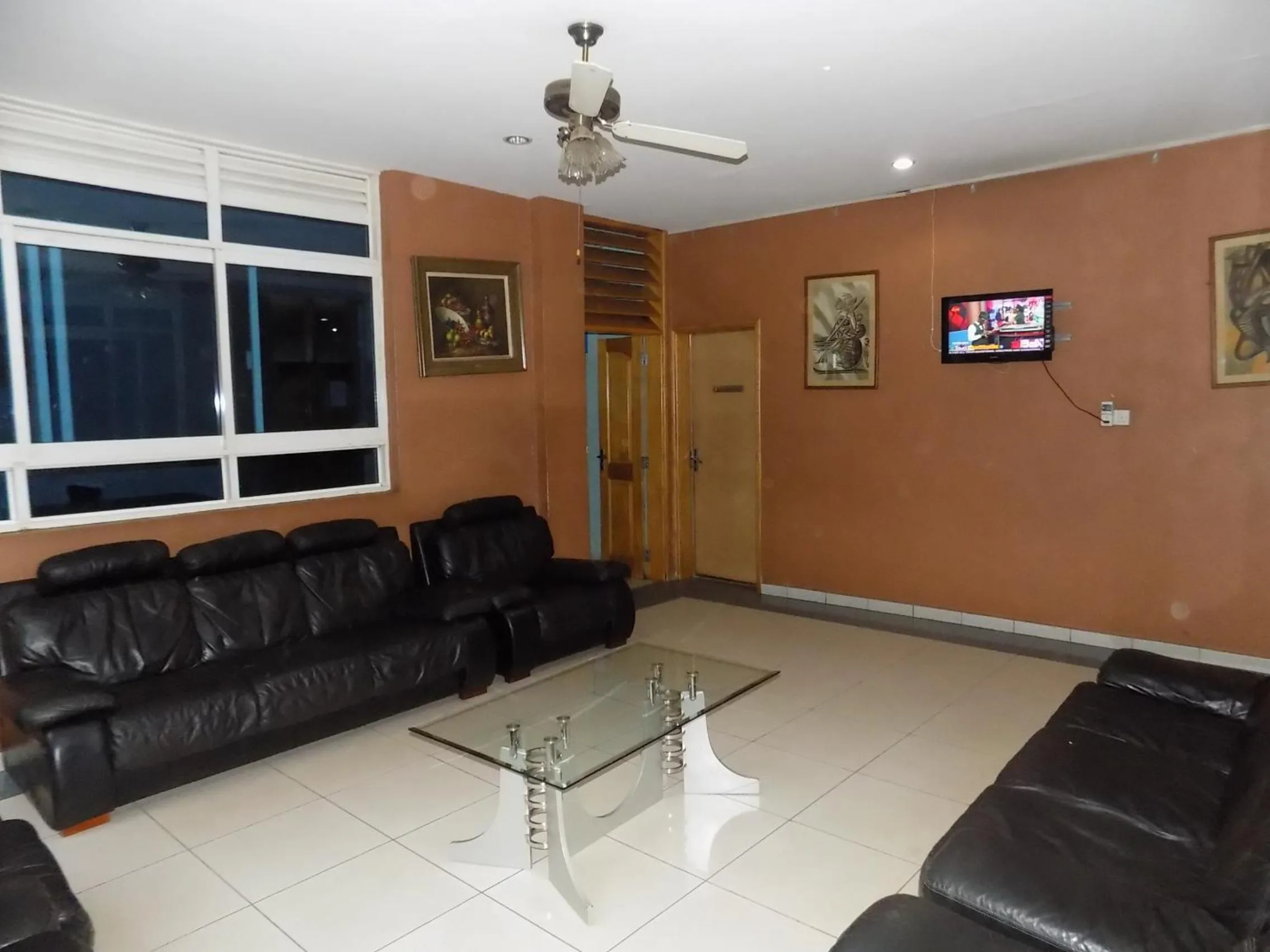 Communal lounge/ TV room in Aponye Hotel Kampala