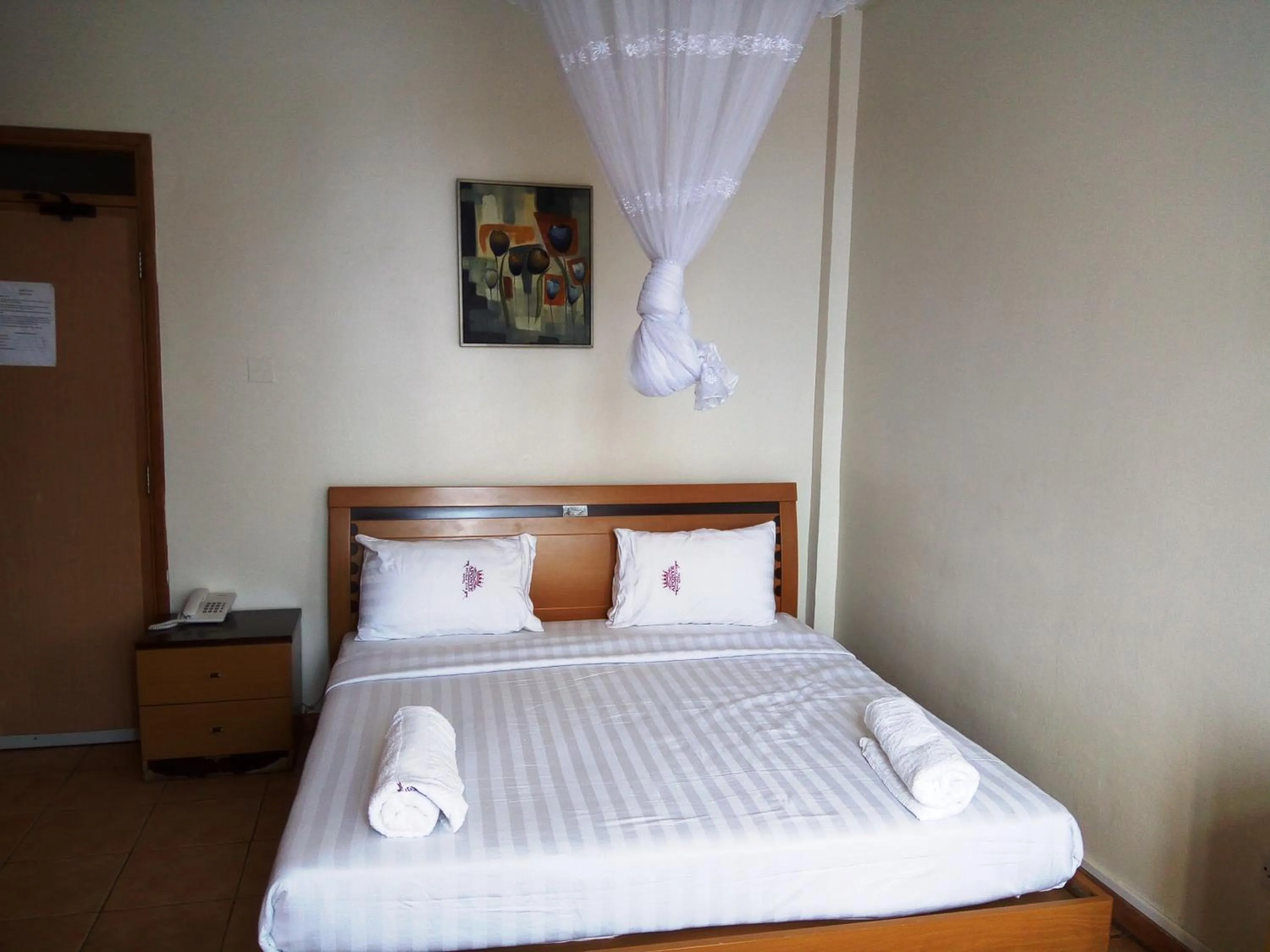 Bed in Aponye Hotel Kampala