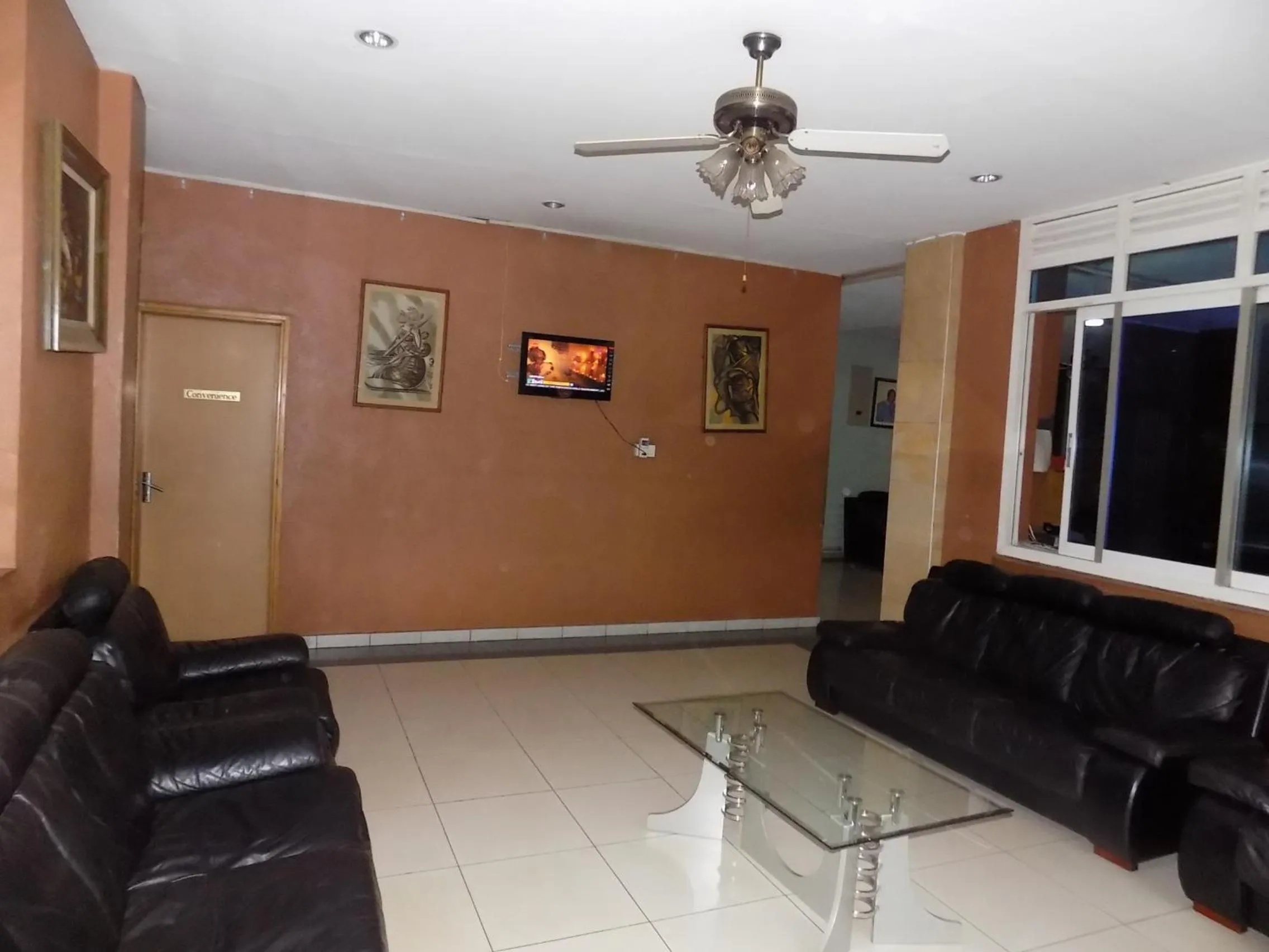 Communal lounge/ TV room in Aponye Hotel Kampala