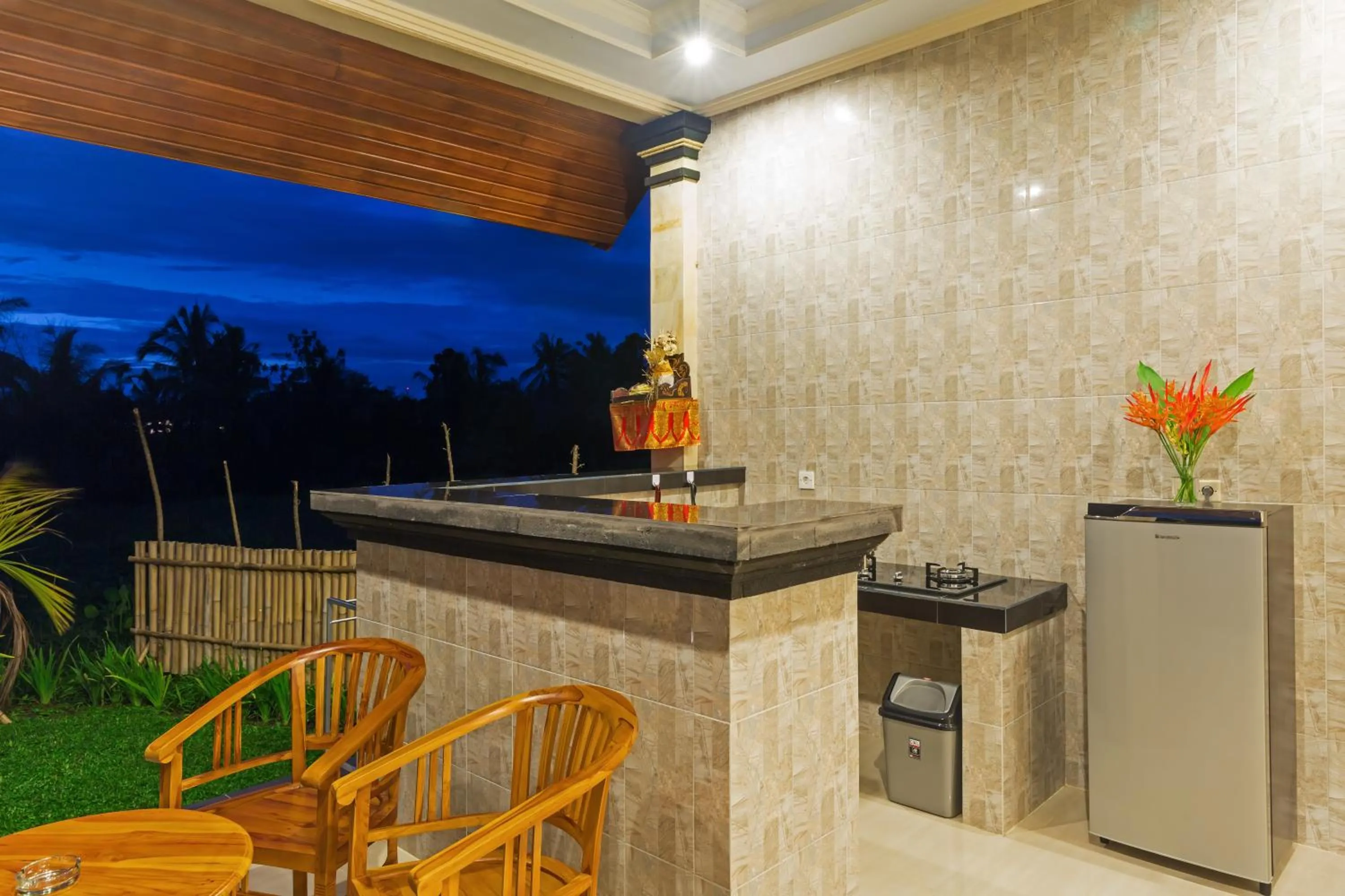 Kitchen or kitchenette in Cahaya Ubud Villa