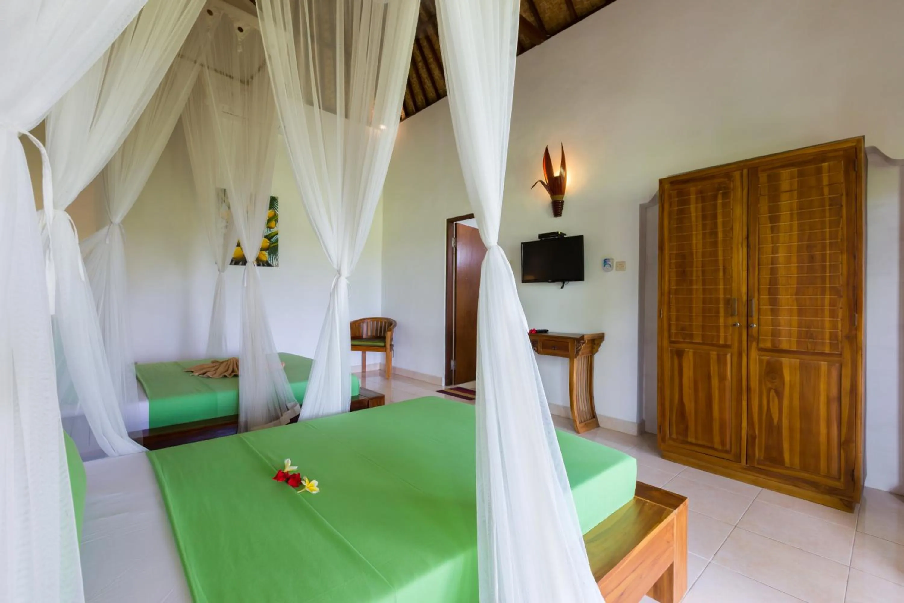 Bed in Cahaya Ubud Villa