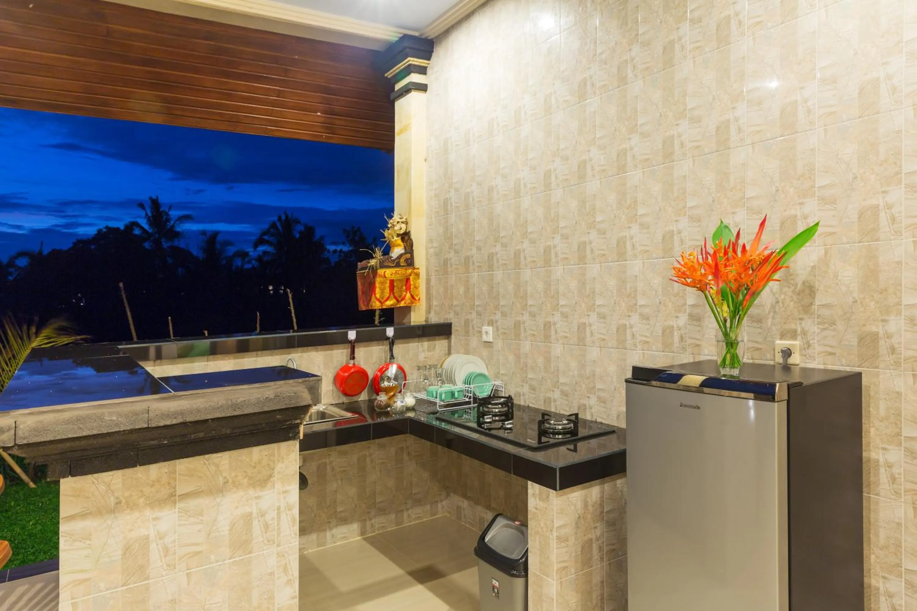 Kitchen or kitchenette in Cahaya Ubud Villa