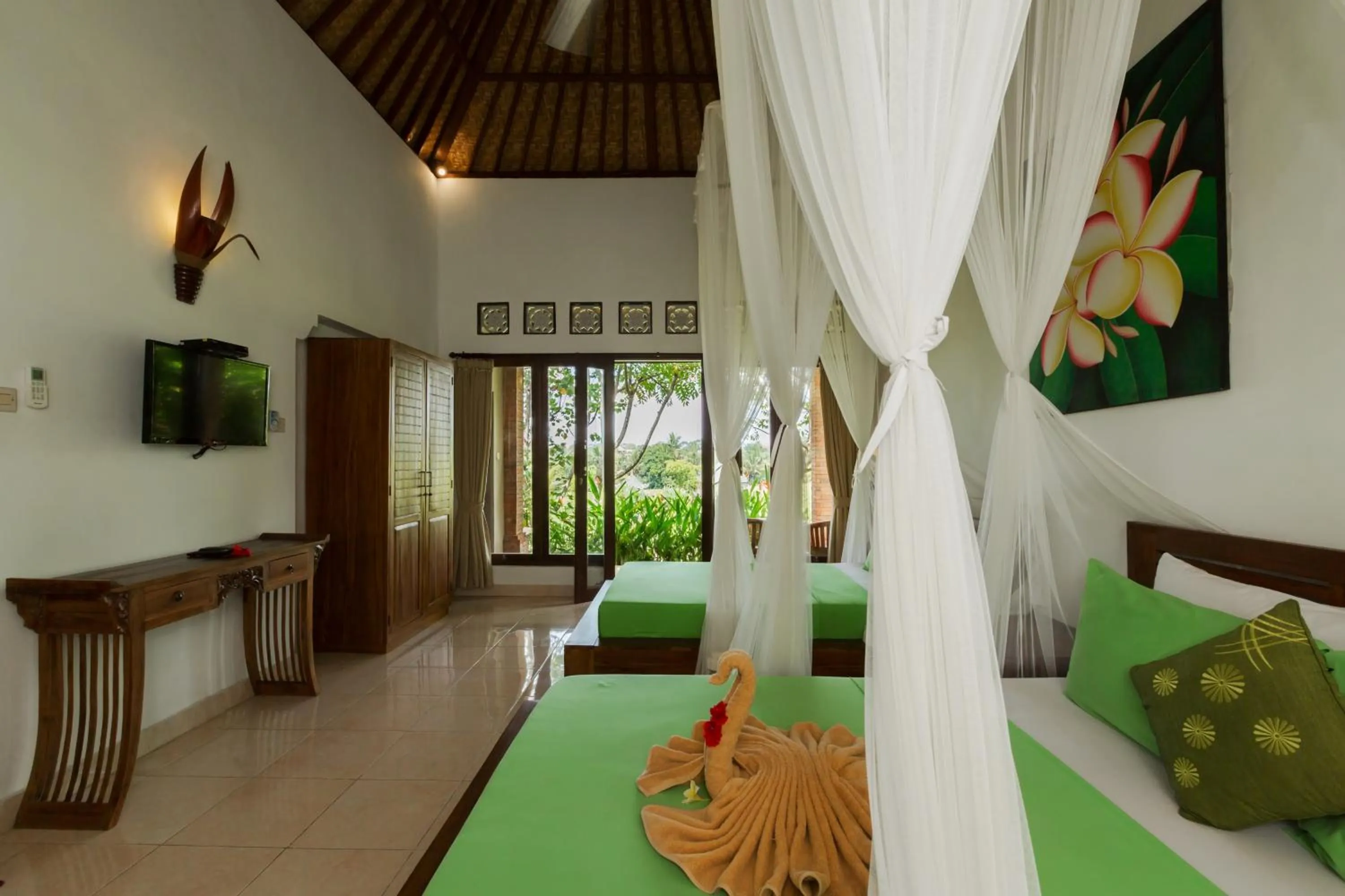 Bed in Cahaya Ubud Villa