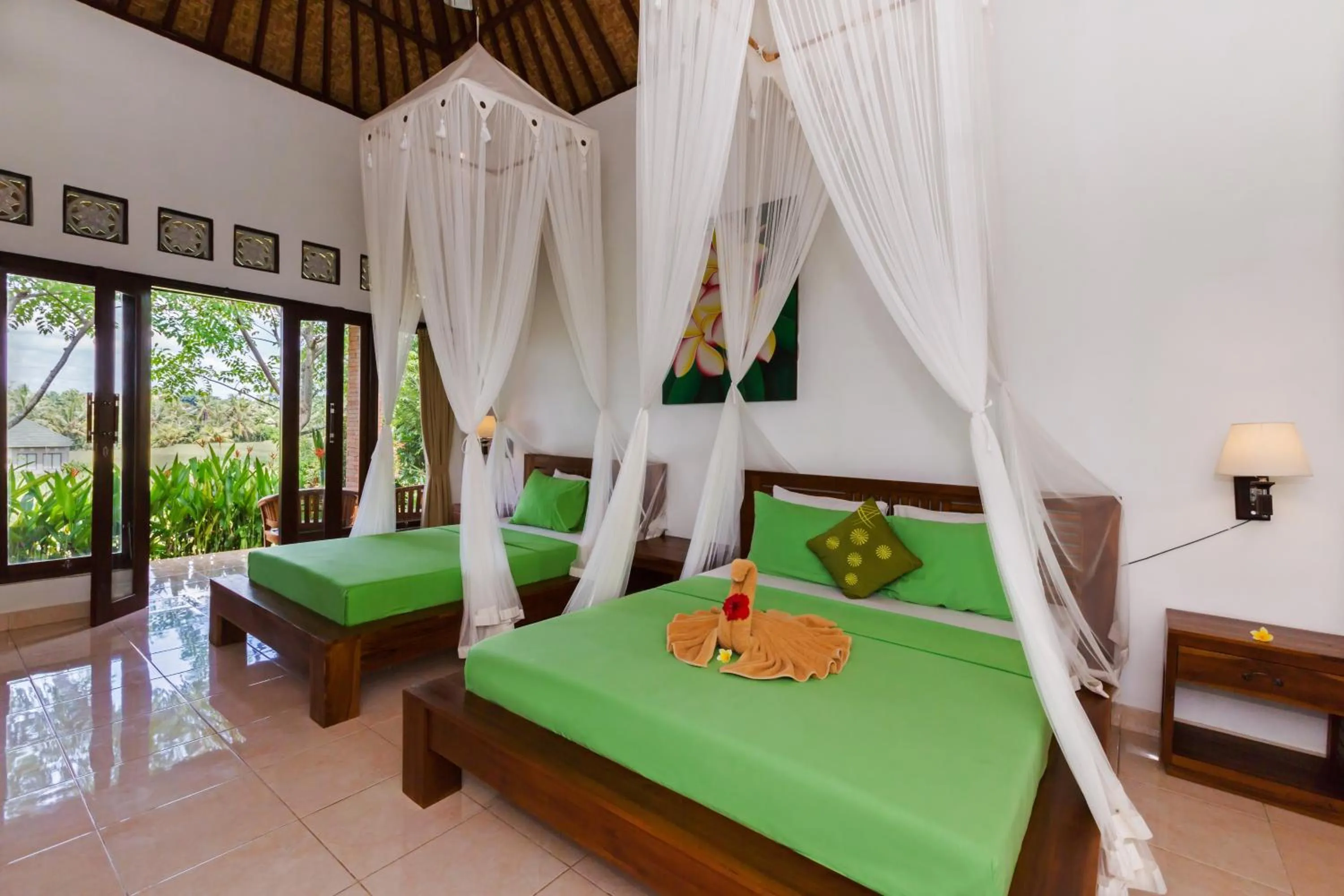 Bed in Cahaya Ubud Villa