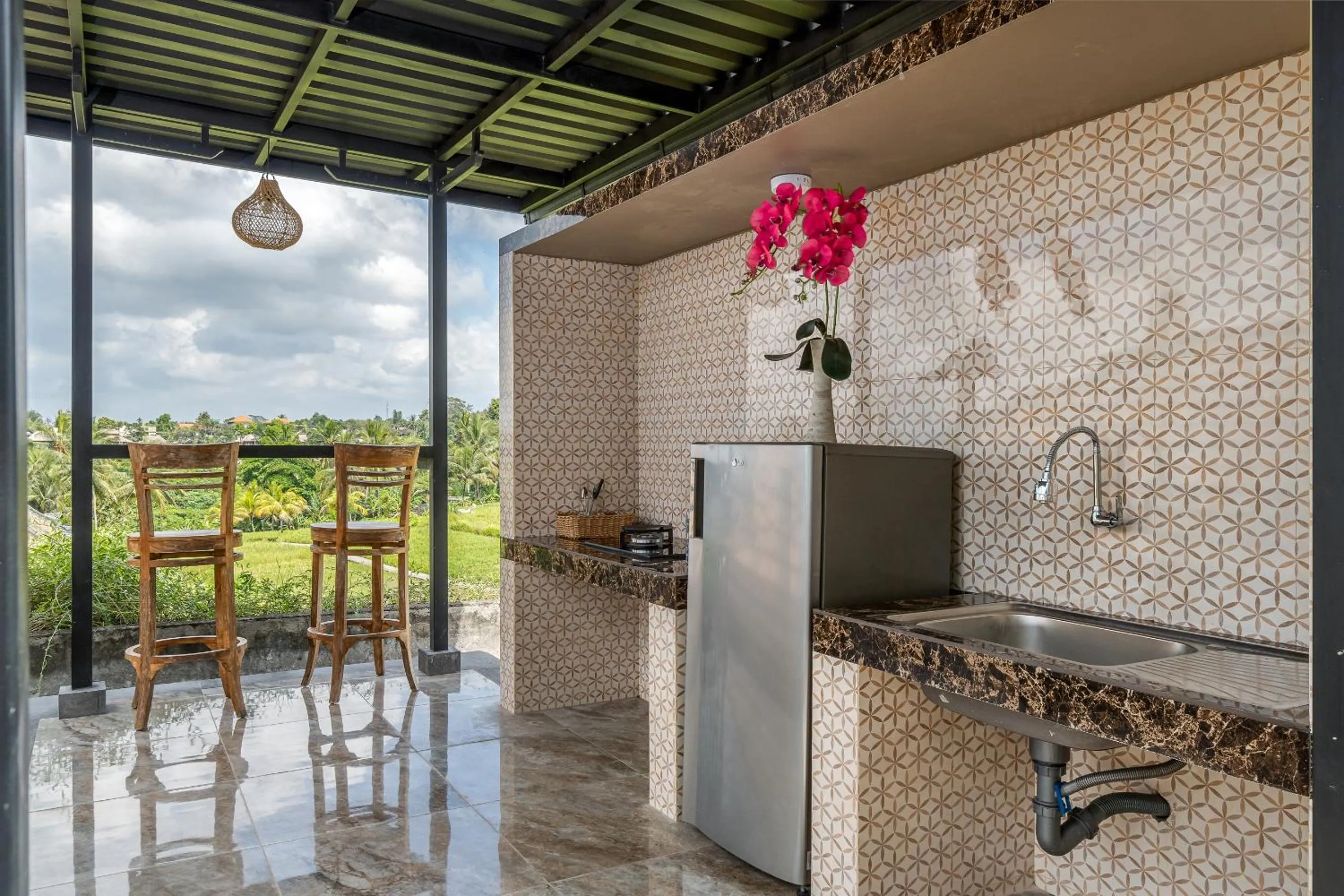 Kitchen or kitchenette in Cahaya Ubud Villa