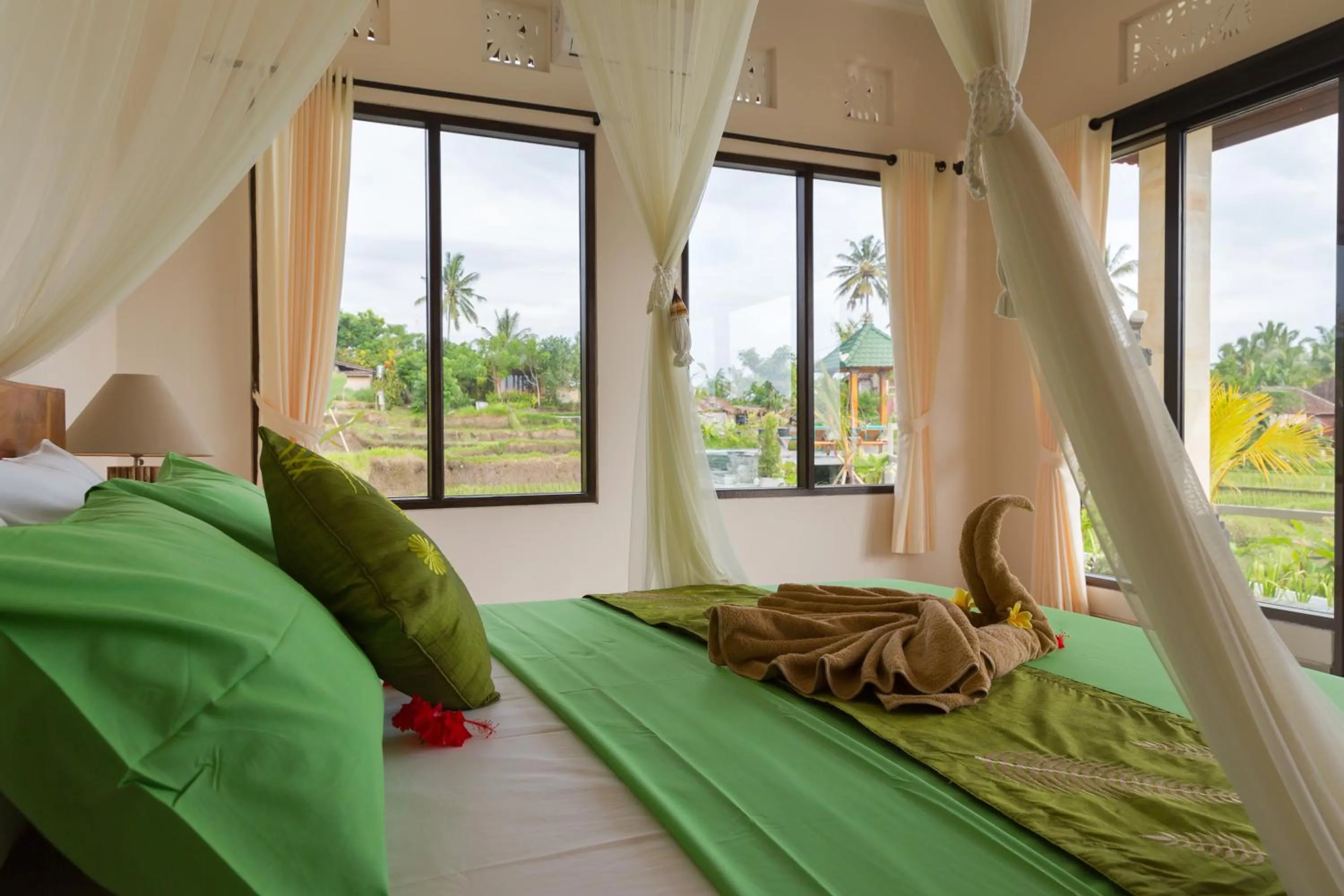 Bed in Cahaya Ubud Villa