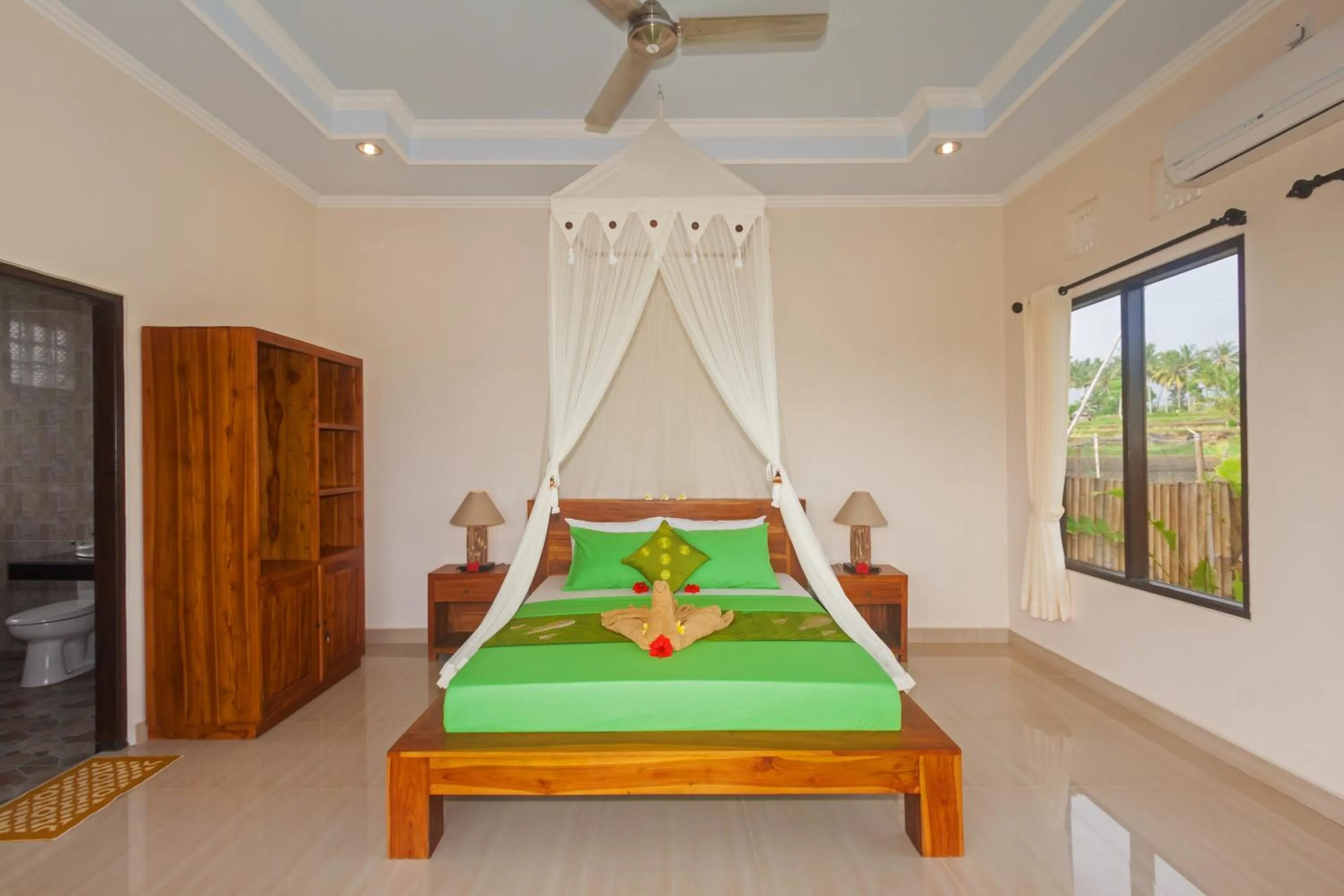 Bed in Cahaya Ubud Villa