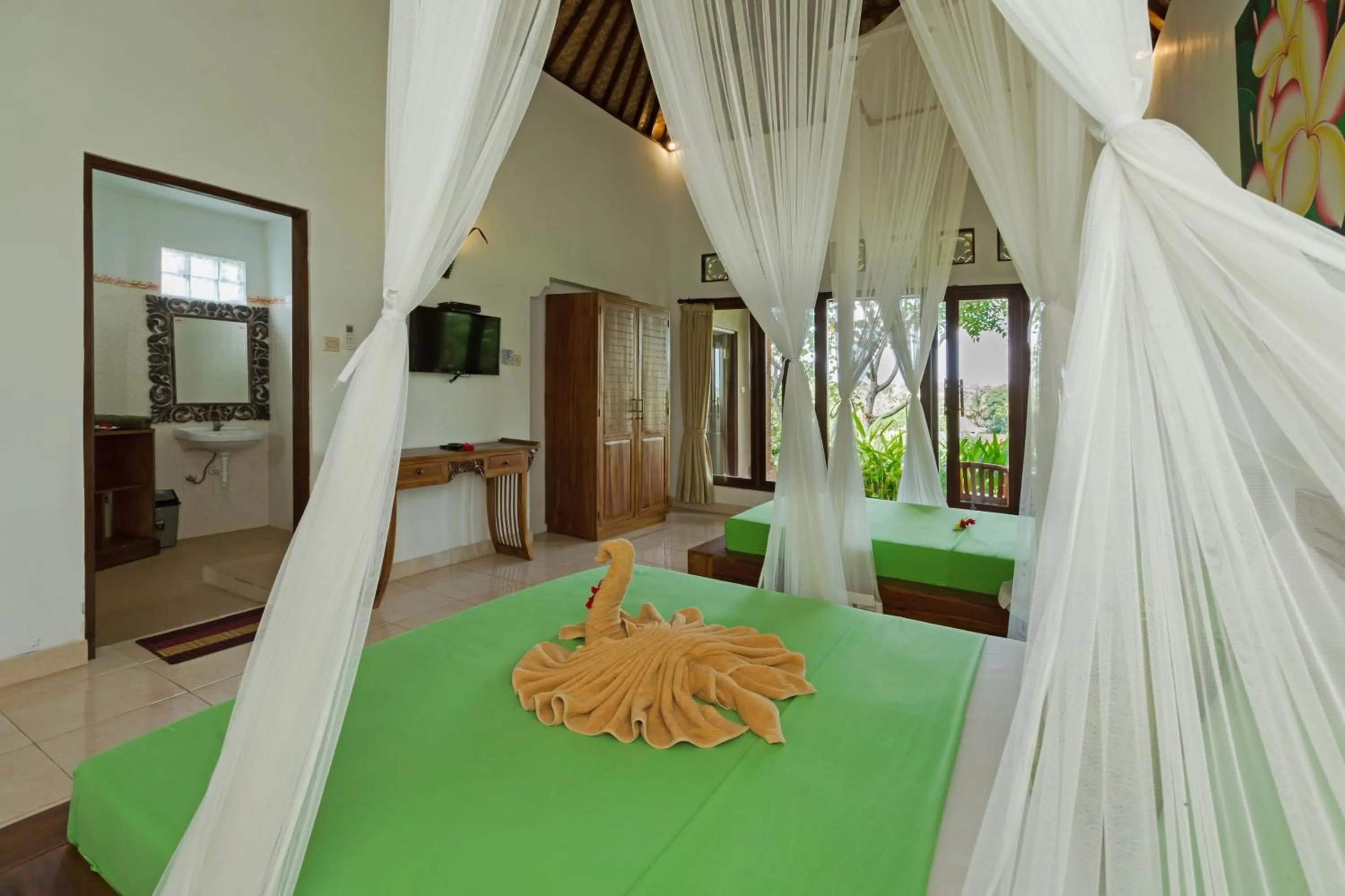 Bed in Cahaya Ubud Villa