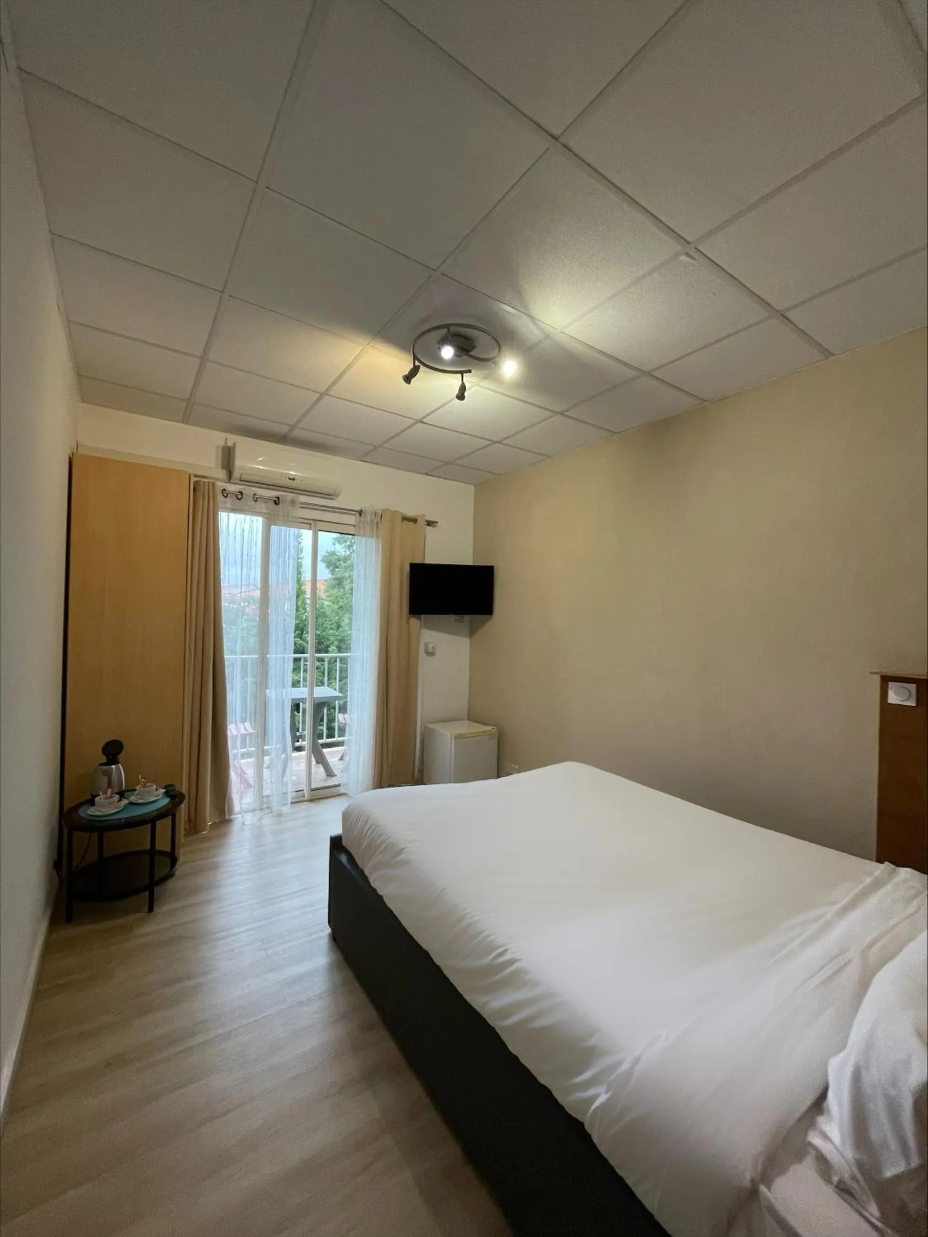 Bed in Acapella Hotel