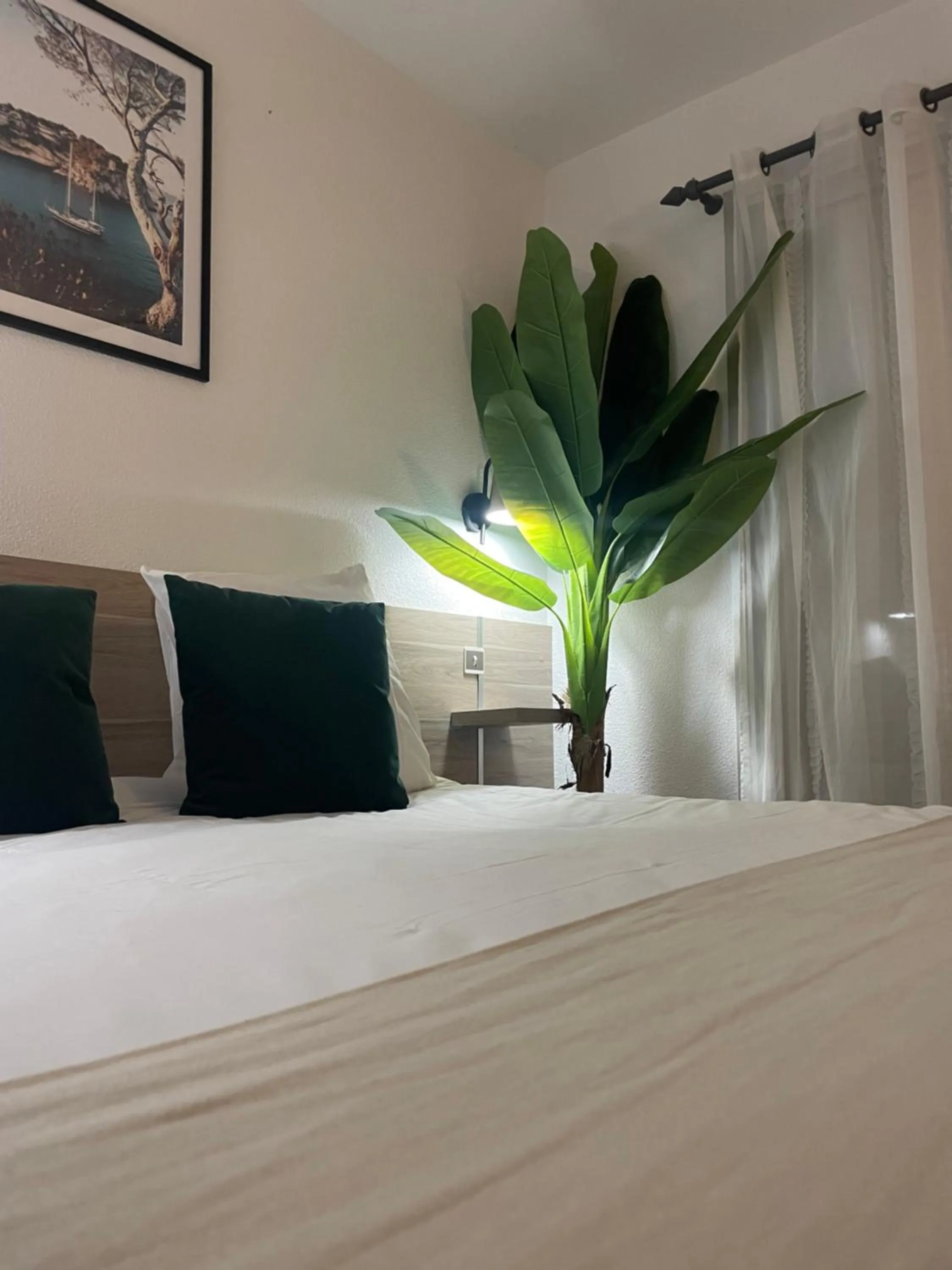 Bedroom in Acapella Hotel