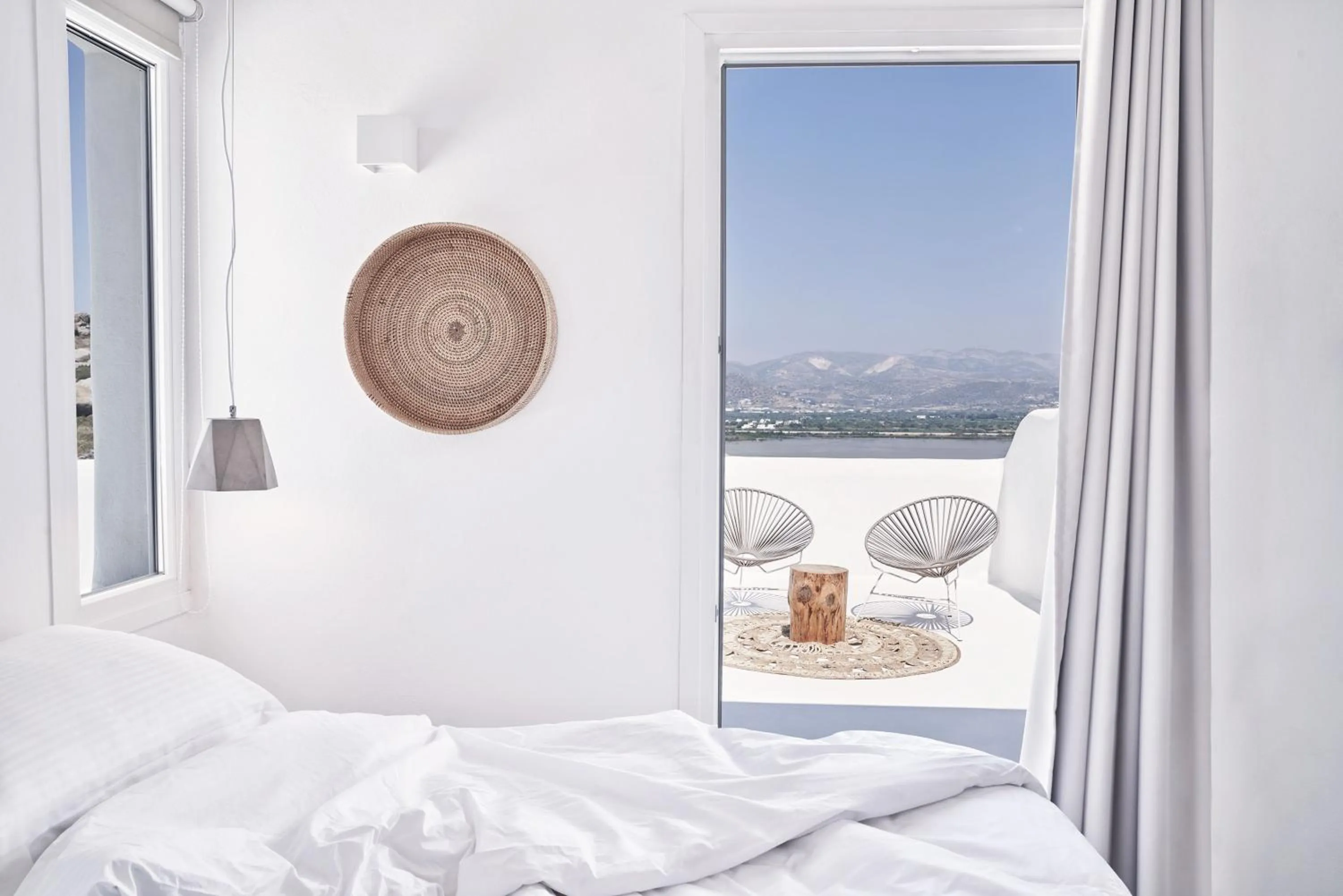Bed in Naxian Utopia | Luxury Villas & Suites