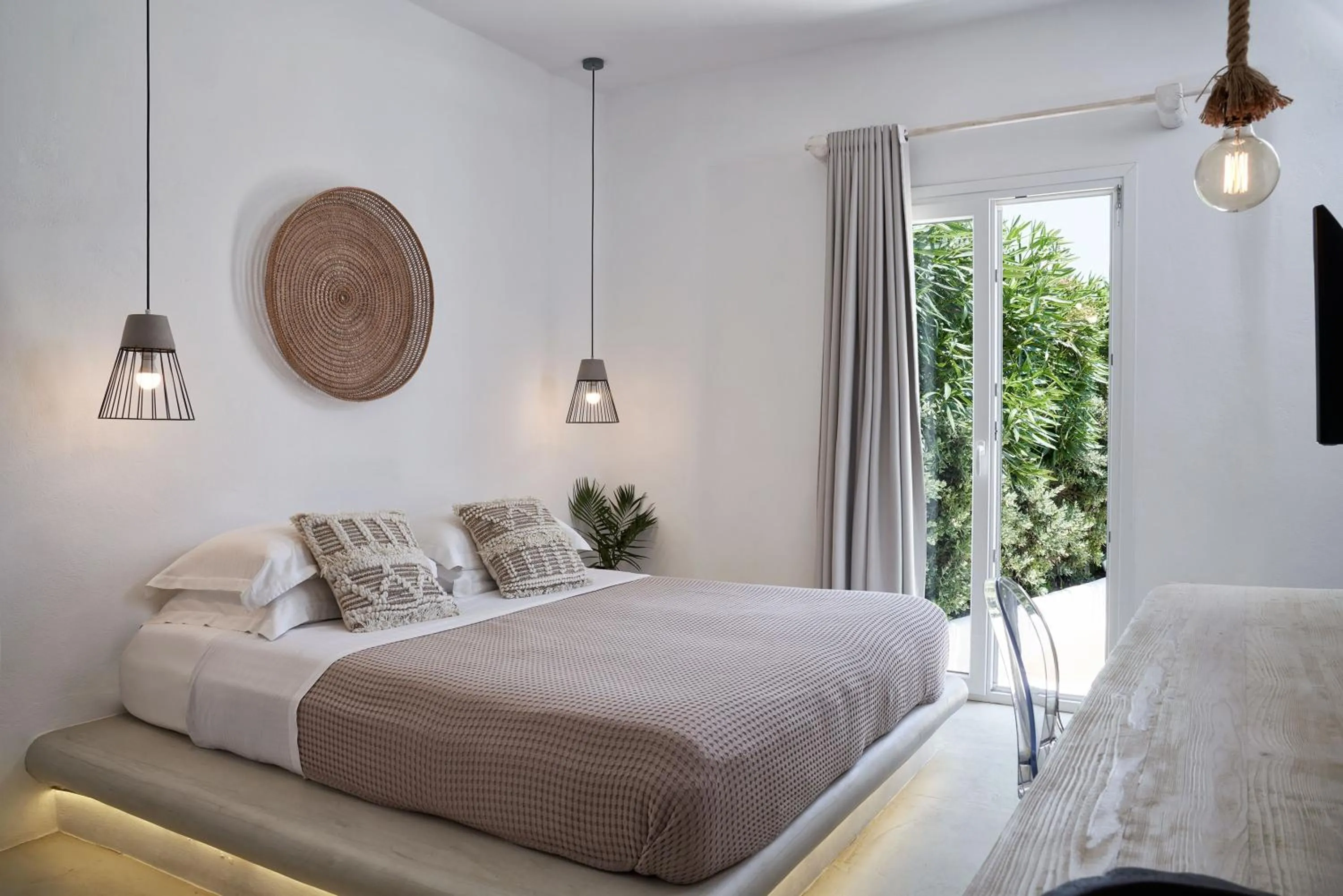 Bed in Naxian Utopia | Luxury Villas & Suites