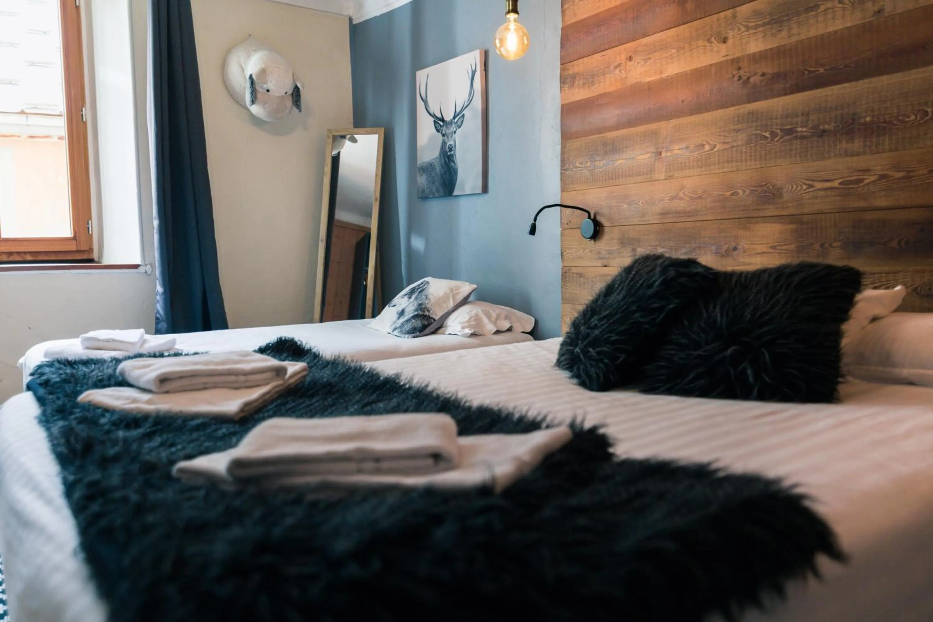 Bed in Auberge de la Paix