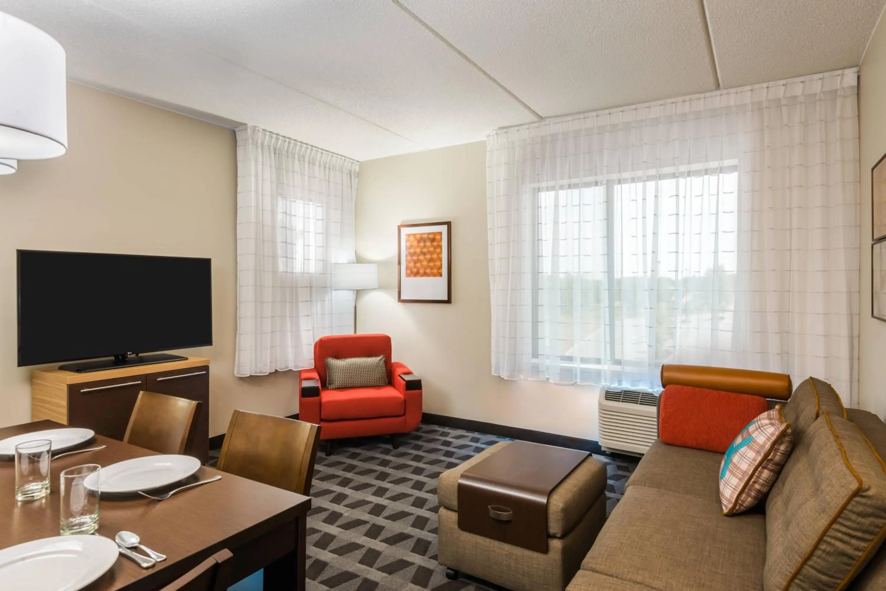 Living room in TownePlace Suites by Marriott Latham Albany Airport